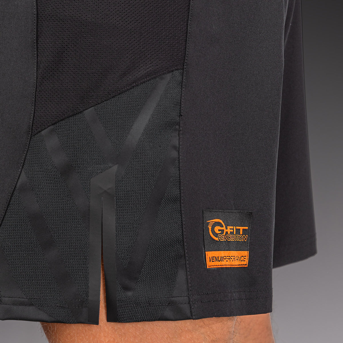 Venum G-Fit Revolution Fightshorts - Negro/Cobre