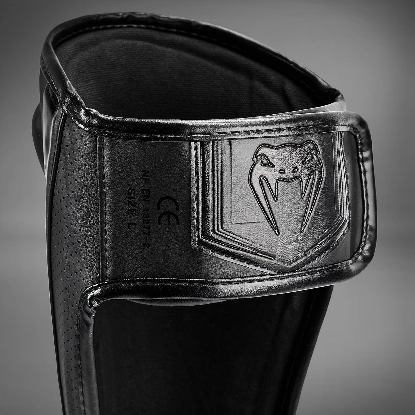 Espinilleras Venum Elite Evo - Negro/Negro