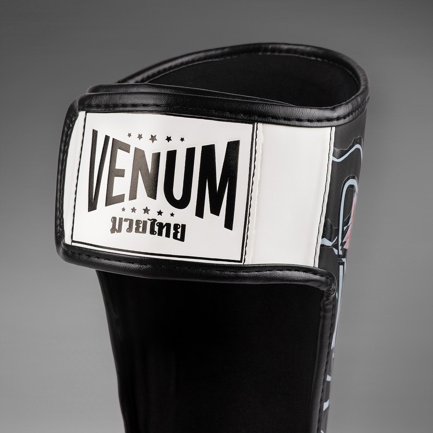 Venum x Tawanchay Espinilleras – Negro/Blanco