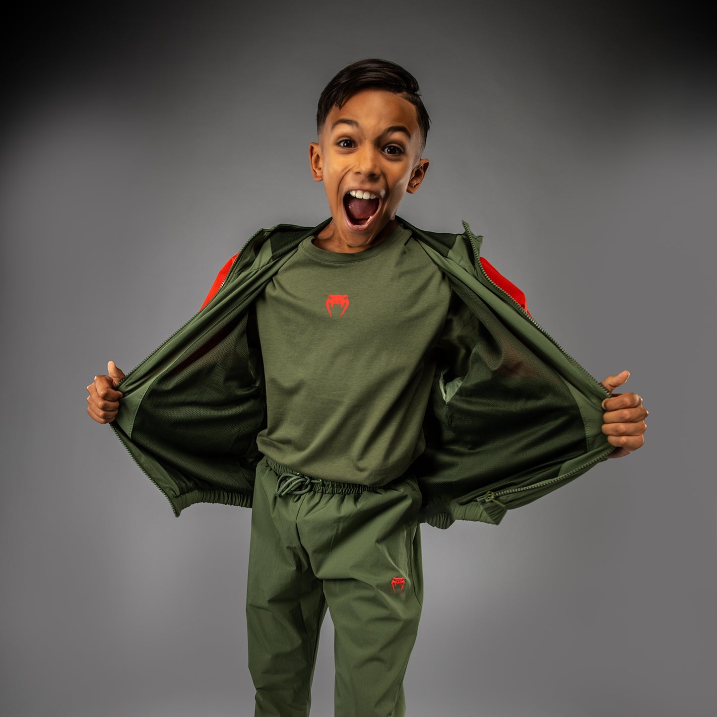 Venum Vectra Chaqueta de Chándal para Niños - Verde Ejército/Naranja
