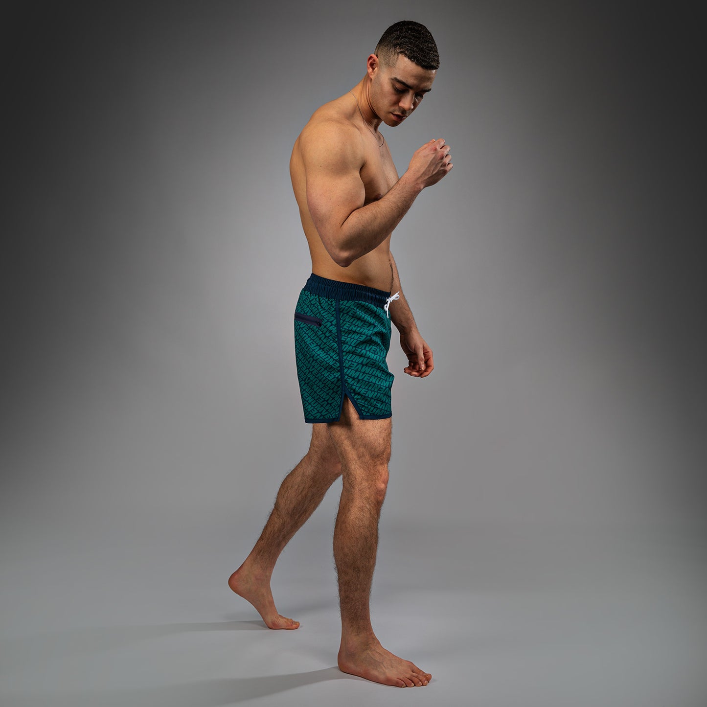 Venum Echo Board Shorts - Azul Profundo/Verde Esmeralda