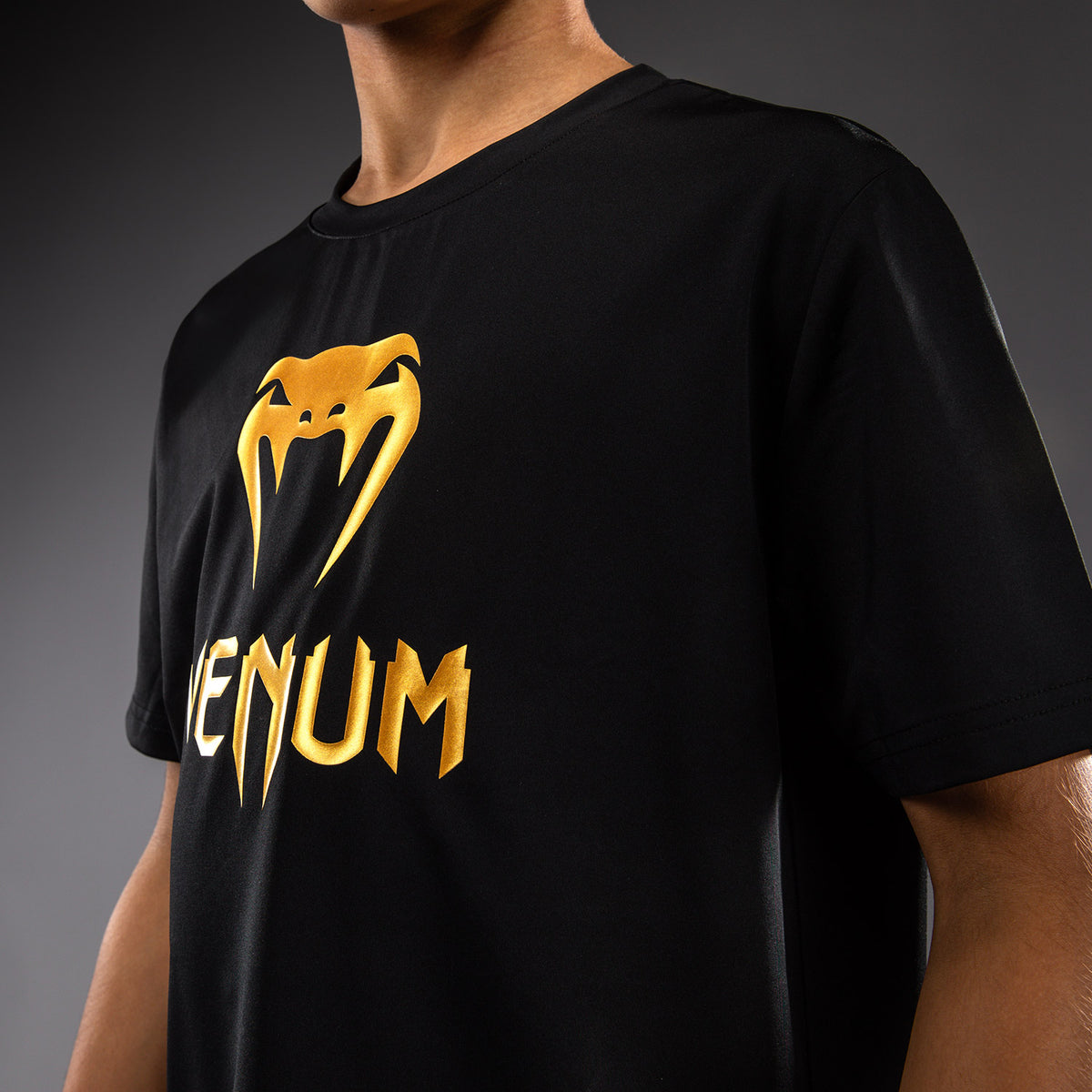 Venum Classic Camiseta Dry Tech para niños - Negro/Dorado