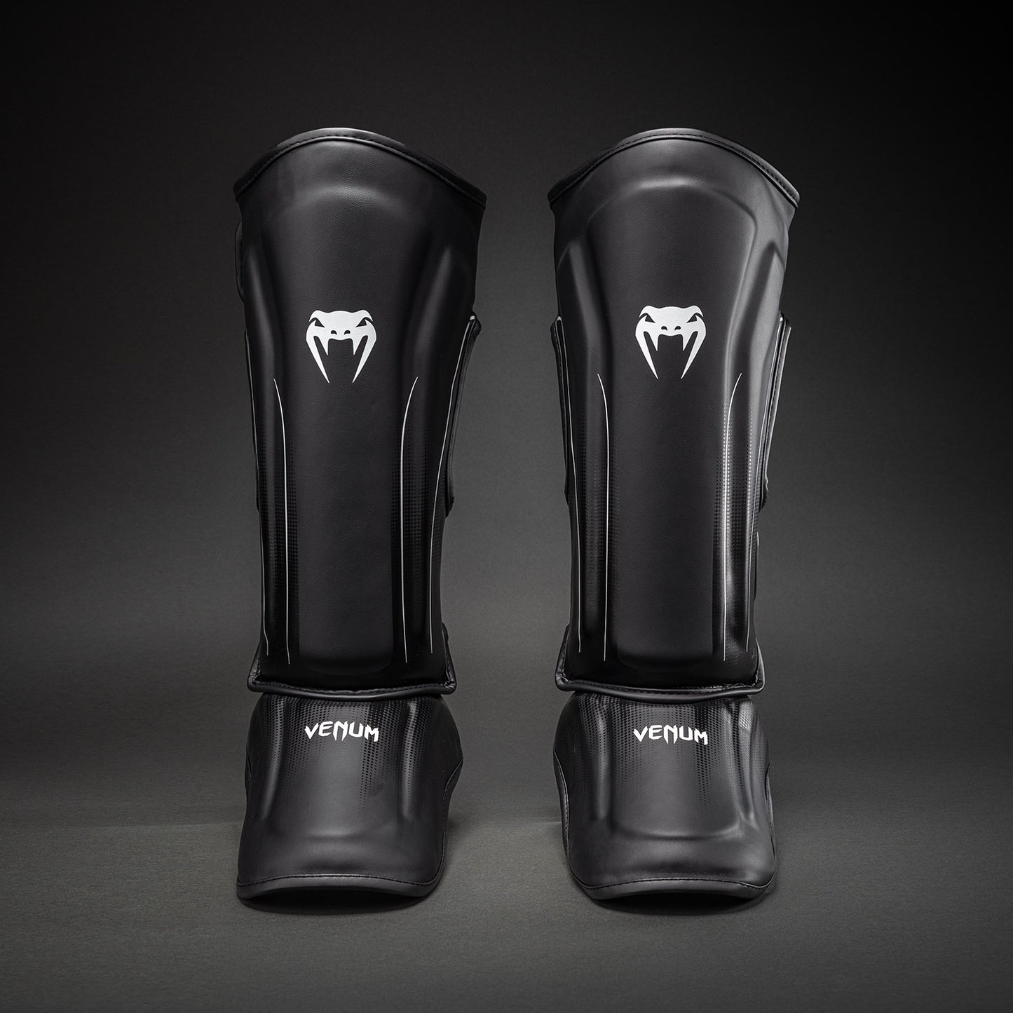 Venum Stealth Espinilleras – Negro/Blanco