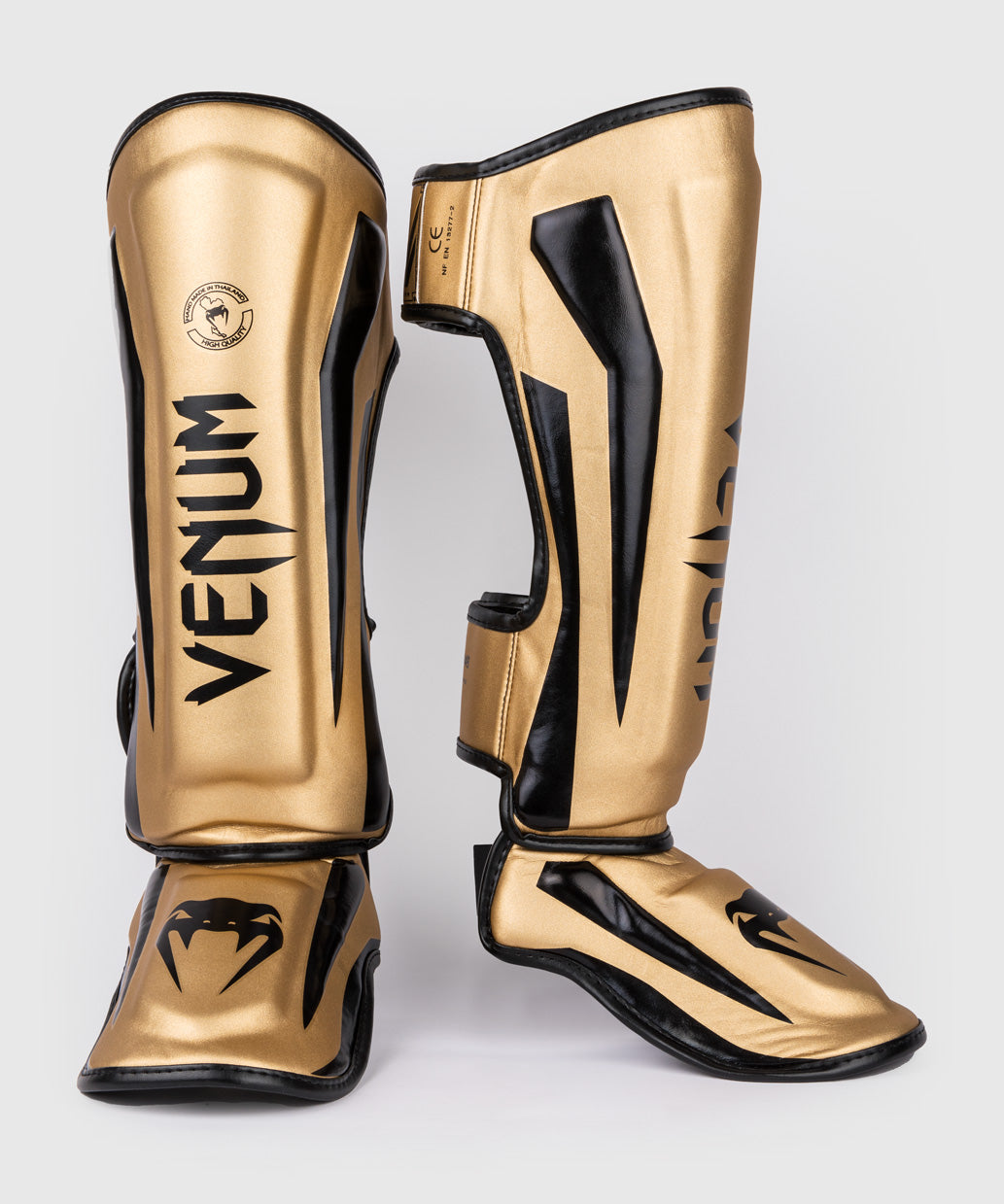 Venum Elite Espinilleras Standup - Oro/Negro