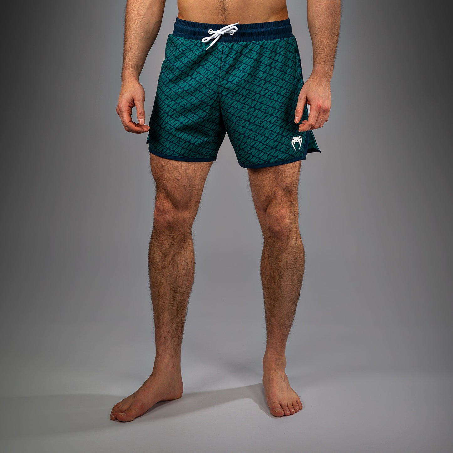 Venum Echo Board Shorts - Azul Profundo/Verde Esmeralda