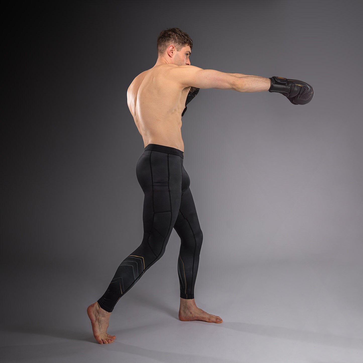 Venum Streamline Spats – Negro/Oro