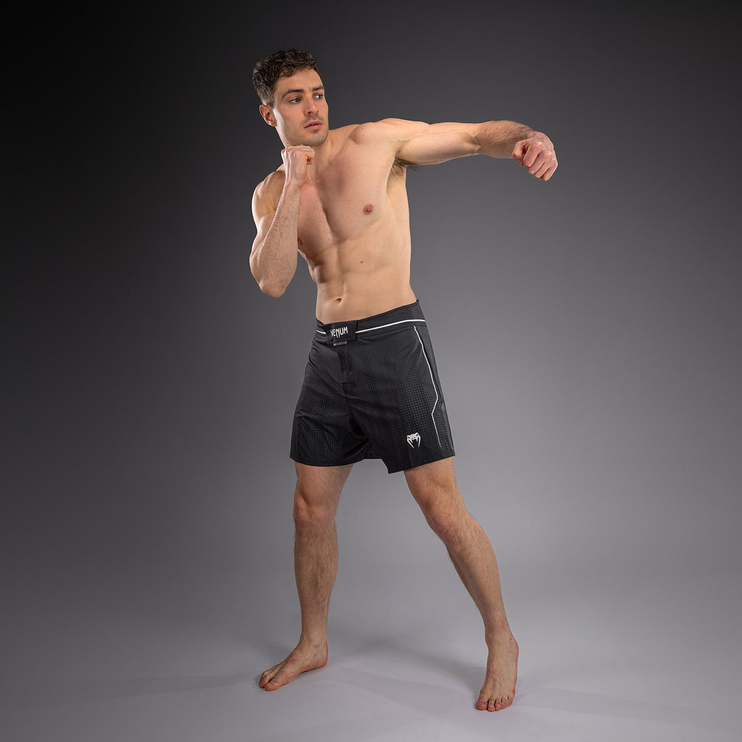 Venum Stealth Short de Combate – Negro/Blanco