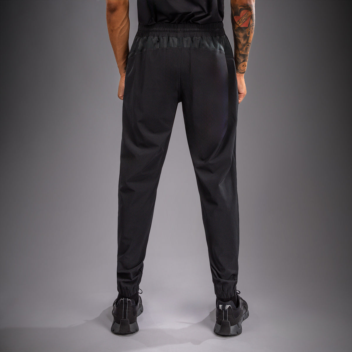 Venum G-Fit Revolution Pantalón de chándal - Negro/Cobre