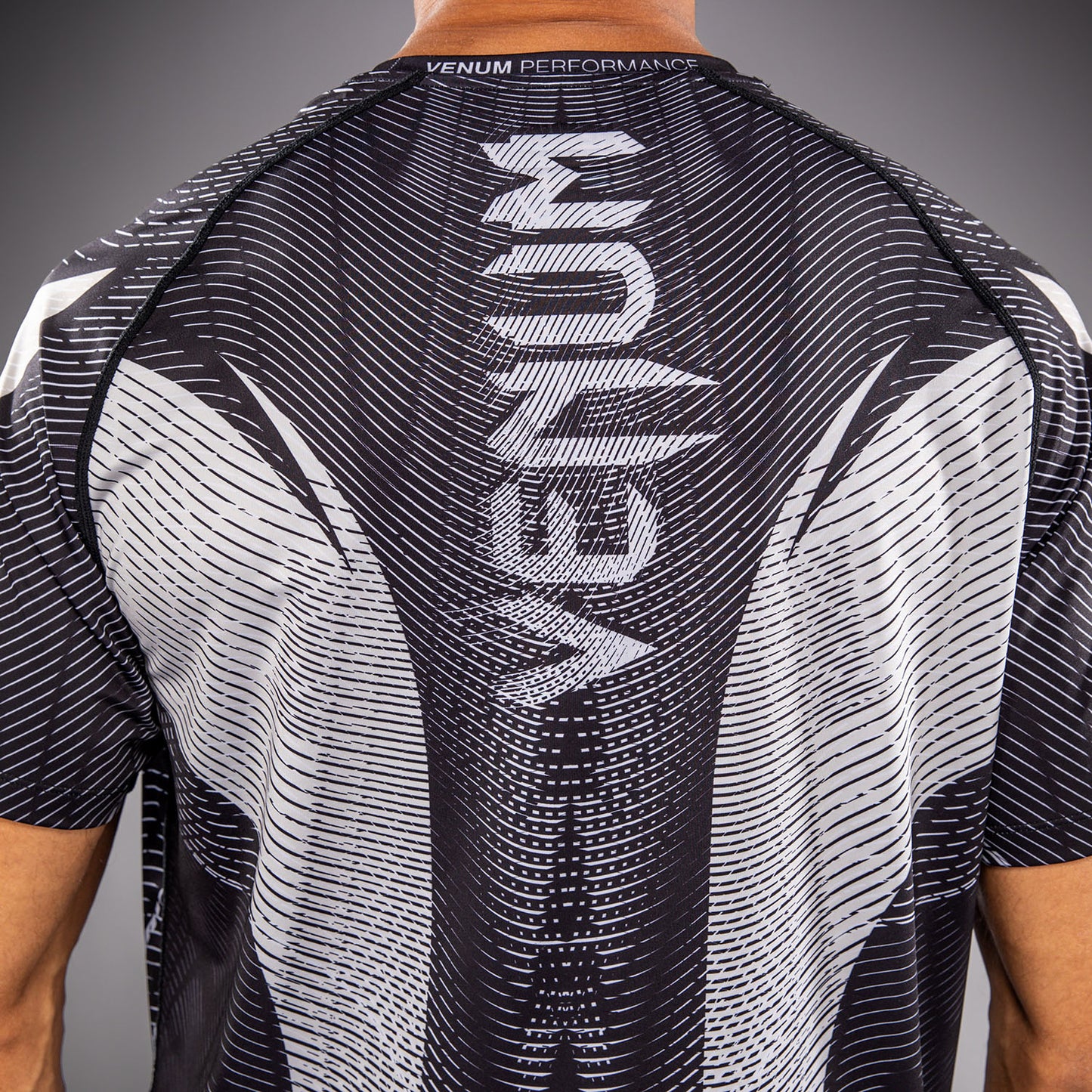 Venum Galactic 3.0 Camiseta Dry Tech - Blanco Hueso/Negro