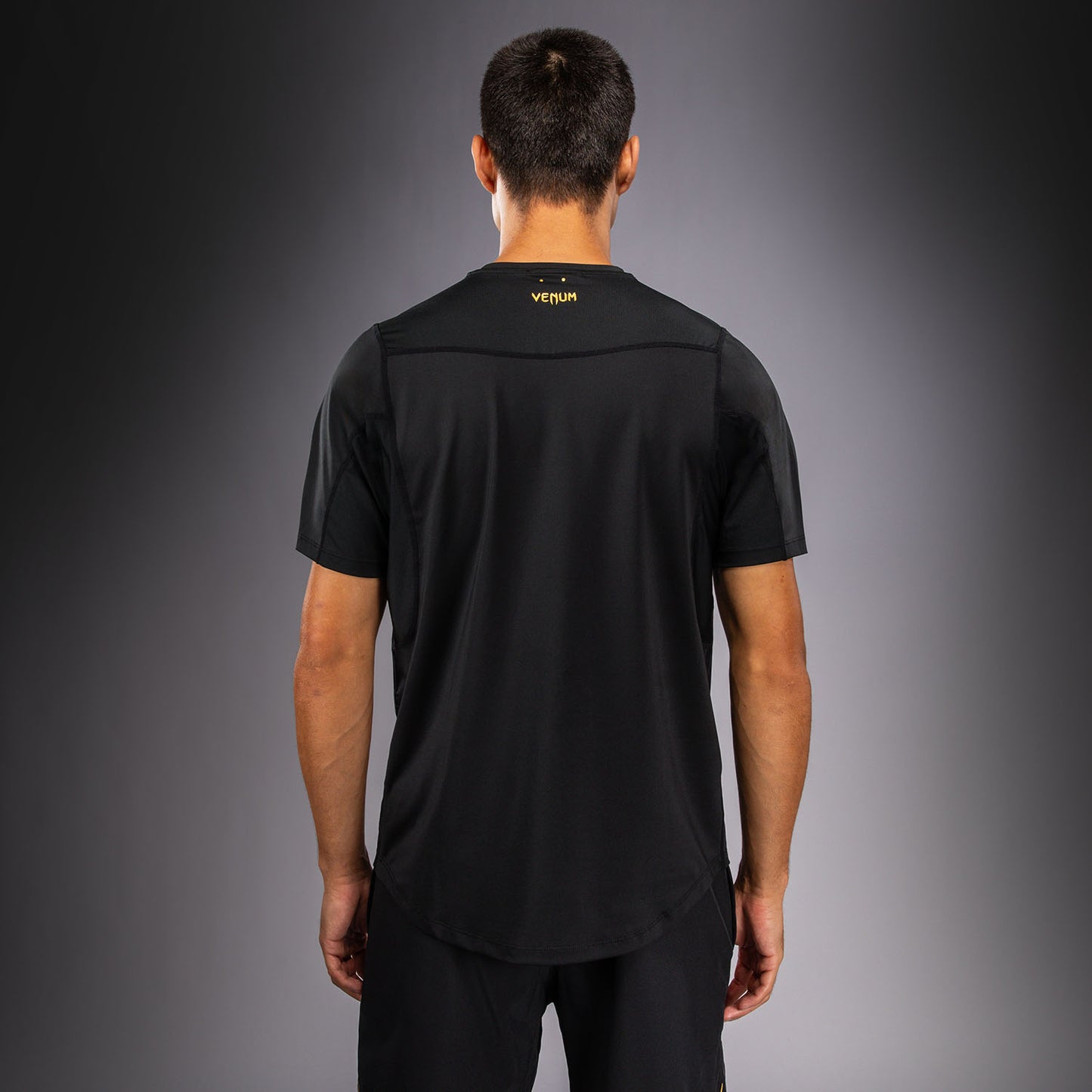 Venum G-Core Camiseta Dry Tech - Negro/Oro