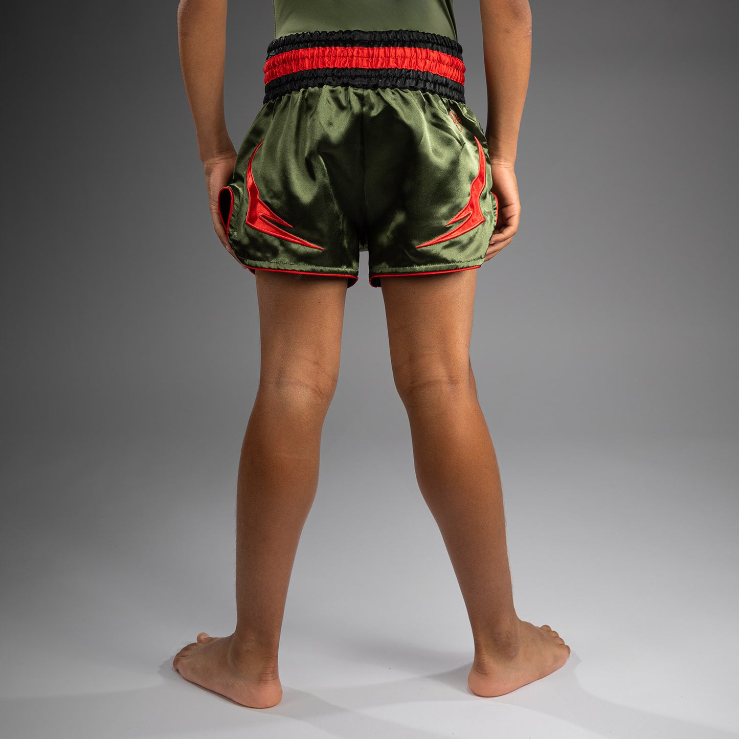 Venum Inferno Pantalones Cortos de Muay Thai para Niños - Verde Ejército/Naranja