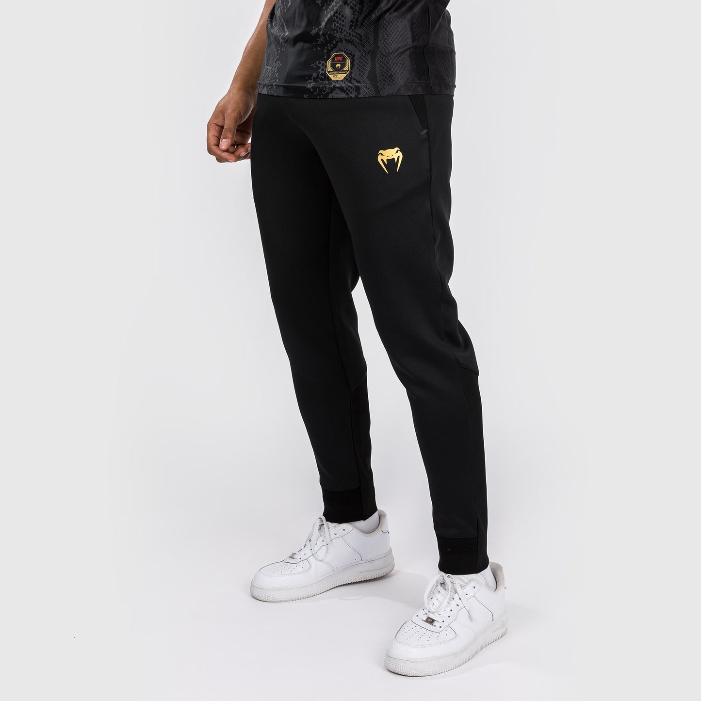 UFC Adrenaline by Venum Authentic Fight Night Pantalón Walkout para Hombre - Champion