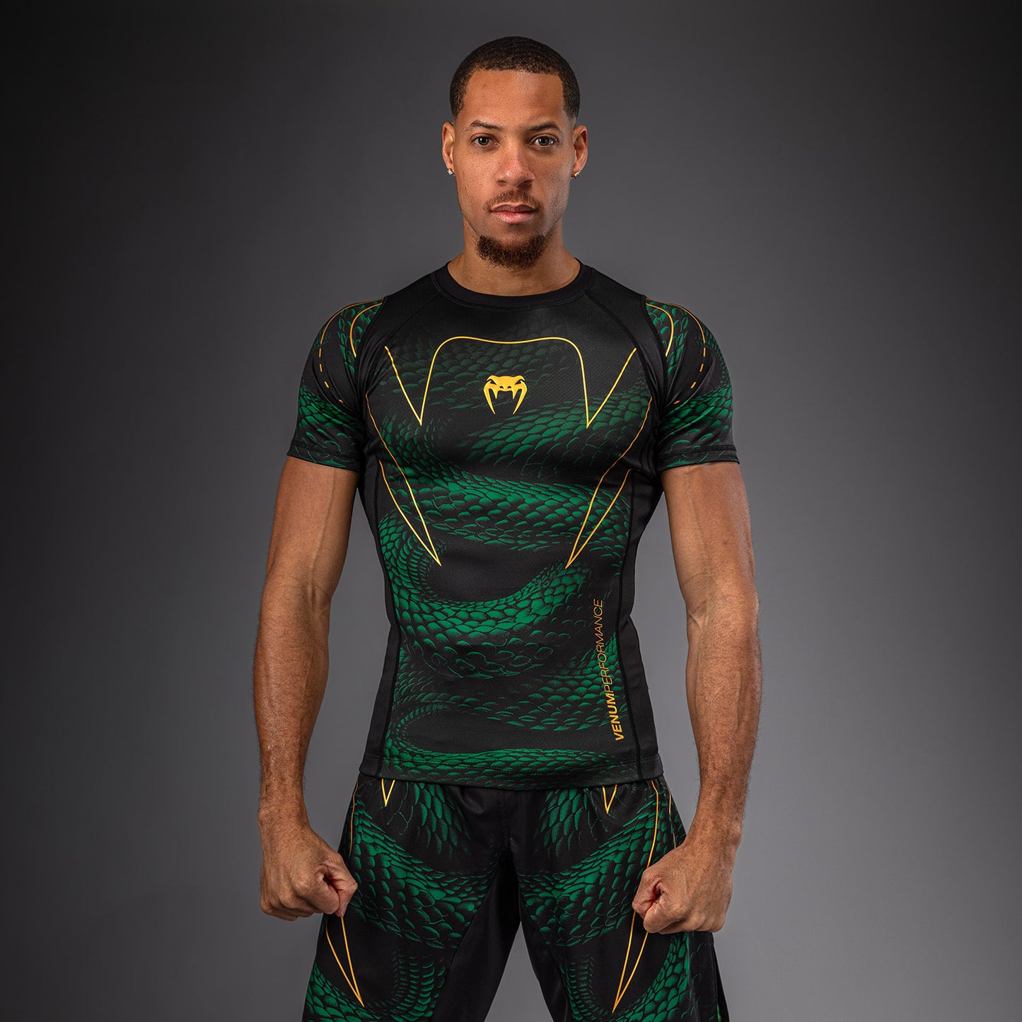 Venum Matupa Rashguard Manga Corta - Negro/Verde/Oro