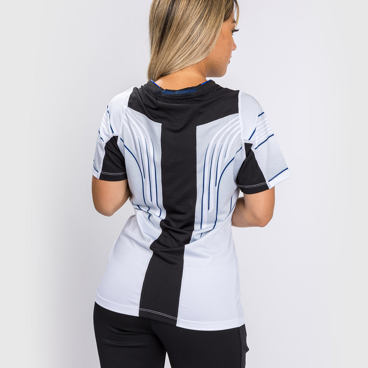 Venum UFC Authentic Fight Night 2.0 Midnight Edition Camiseta Walkout para Mujer – Hielo