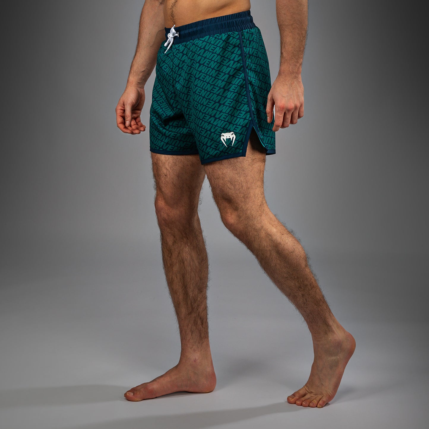 Venum Echo Board Shorts - Azul Profundo/Verde Esmeralda
