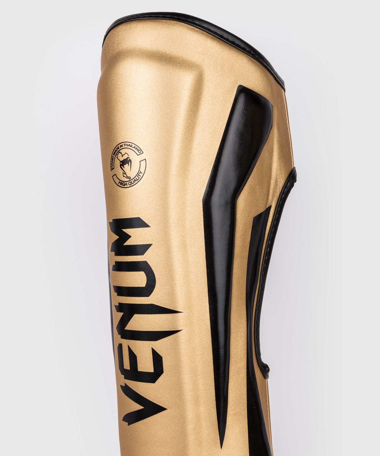 Venum Elite Espinilleras Standup - Oro/Negro