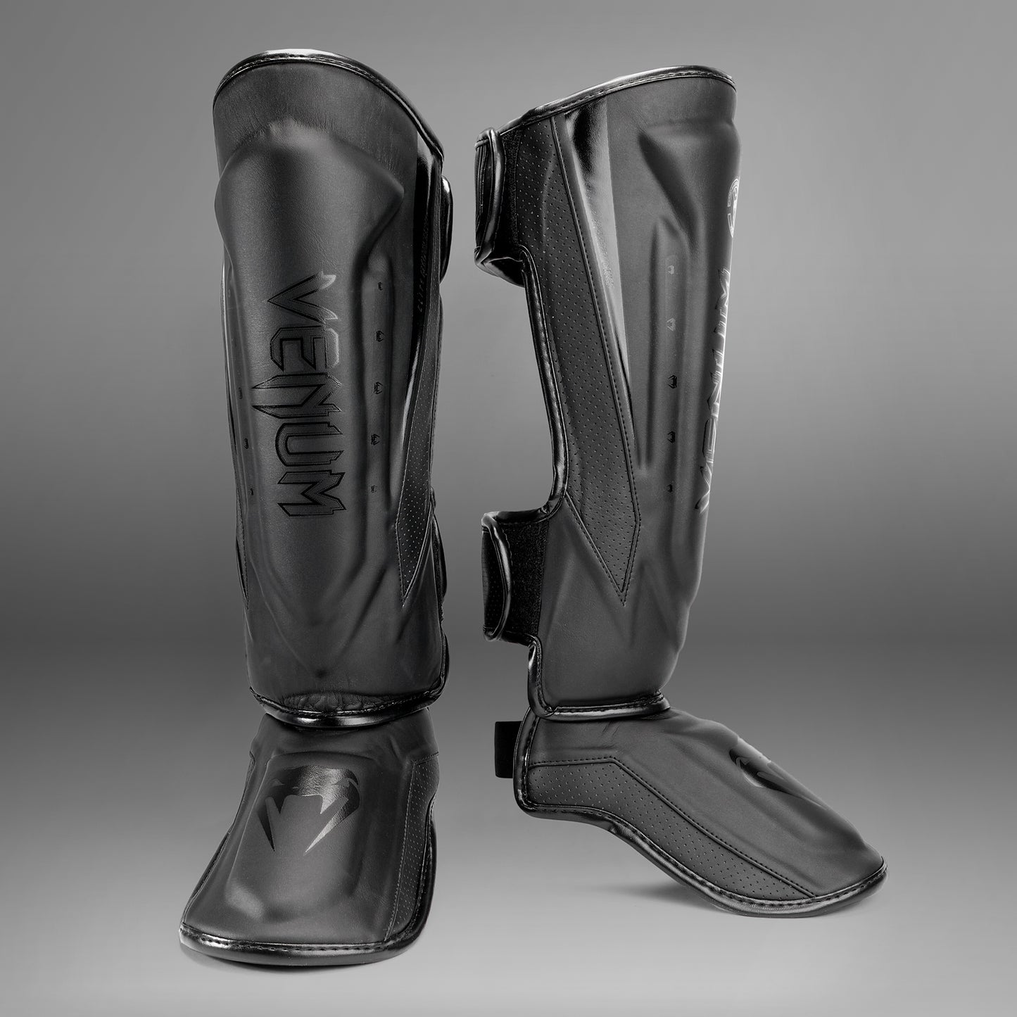 Espinilleras Venum Elite Evo - Negro/Negro
