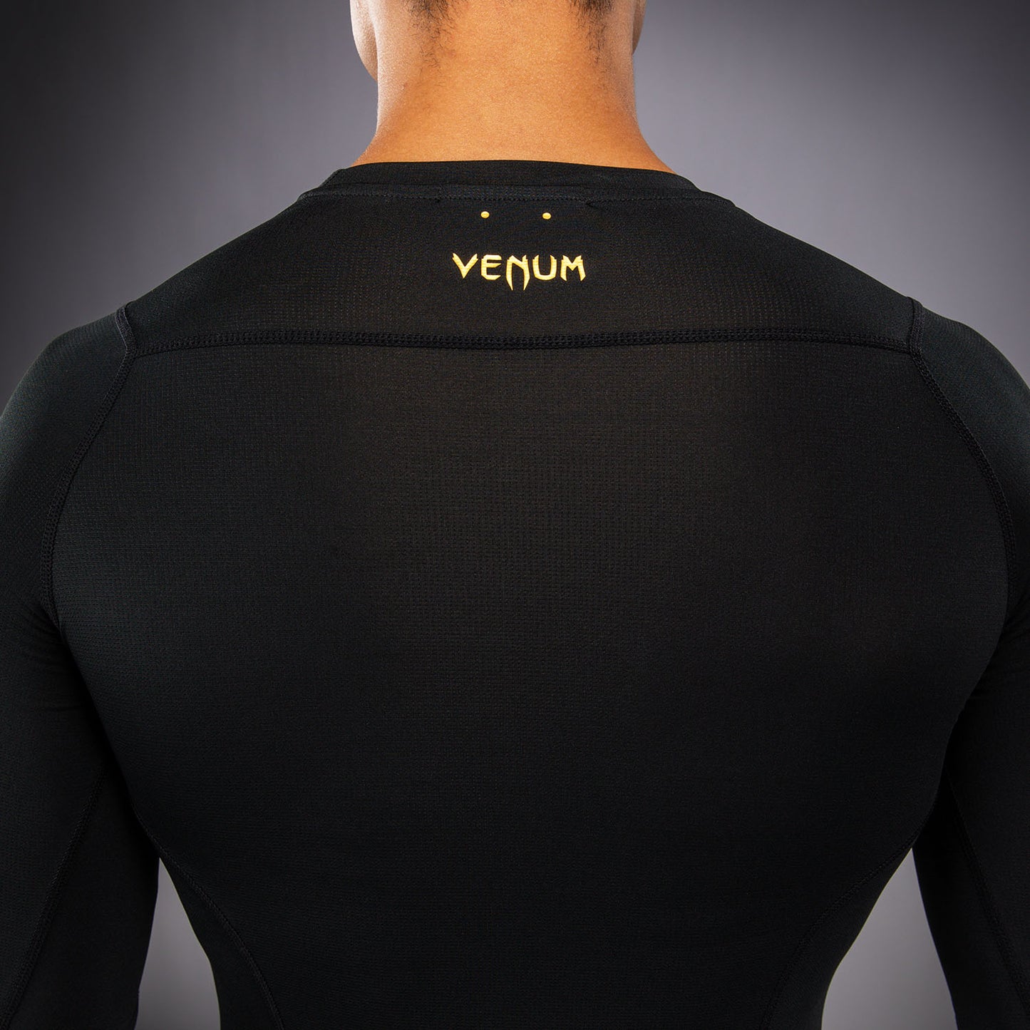 Venum G-Core Rashguard Manga Larga - Negro/Oro
