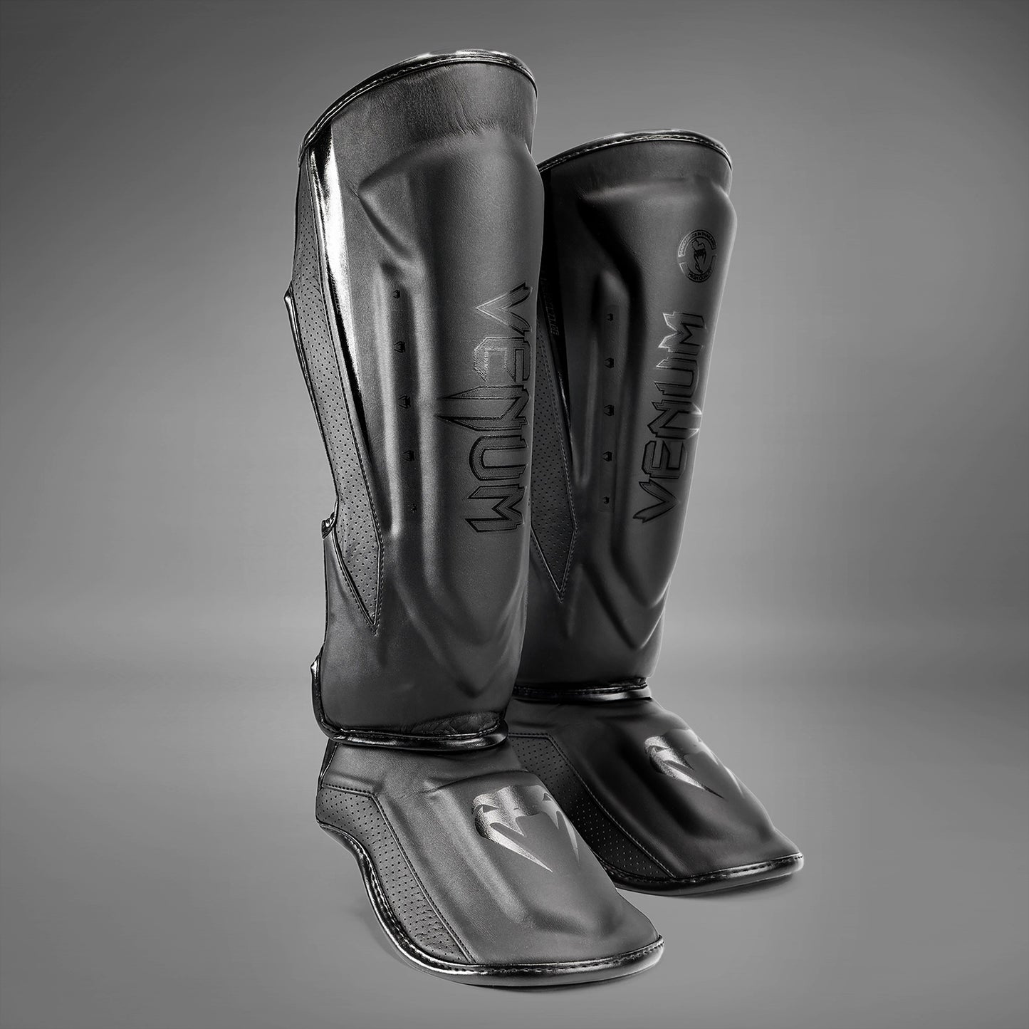 Espinilleras Venum Elite Evo - Negro/Negro