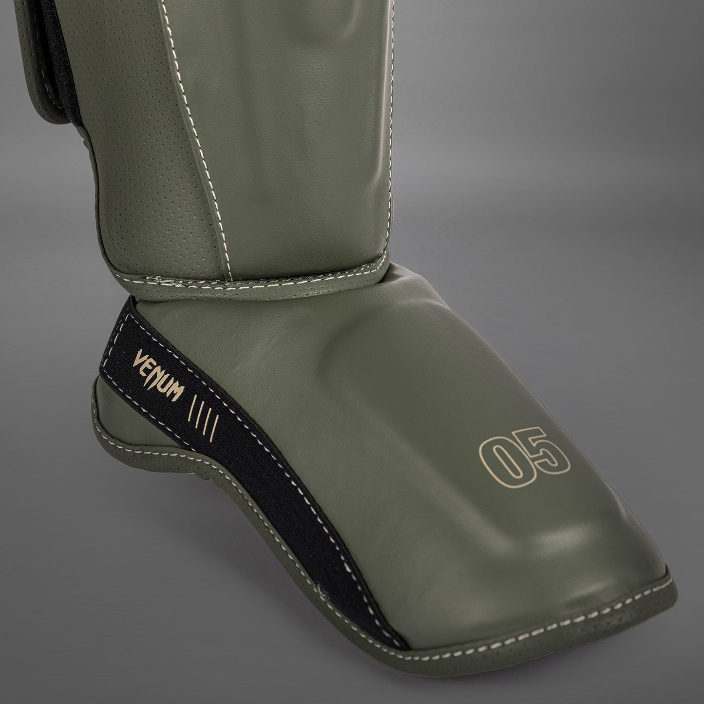 Venum Impact Evo Espinilleras - Verde Militar