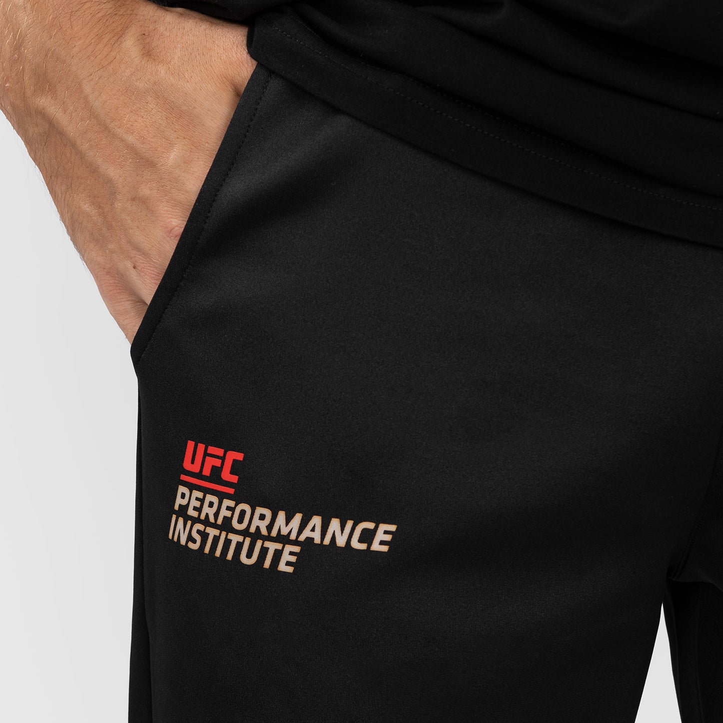 UFC Venum Performance Institute 2.0 Pantalón para Hombre - Negro/Rojo