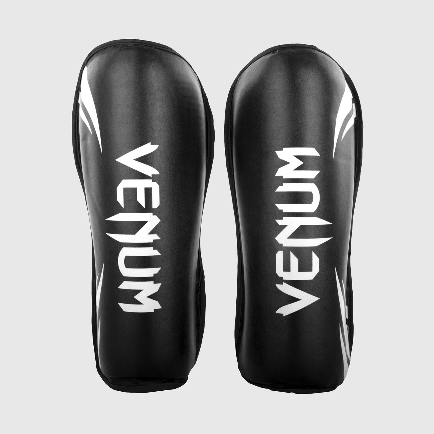 Venum Challenger Espinilleras – Negro/Blanco