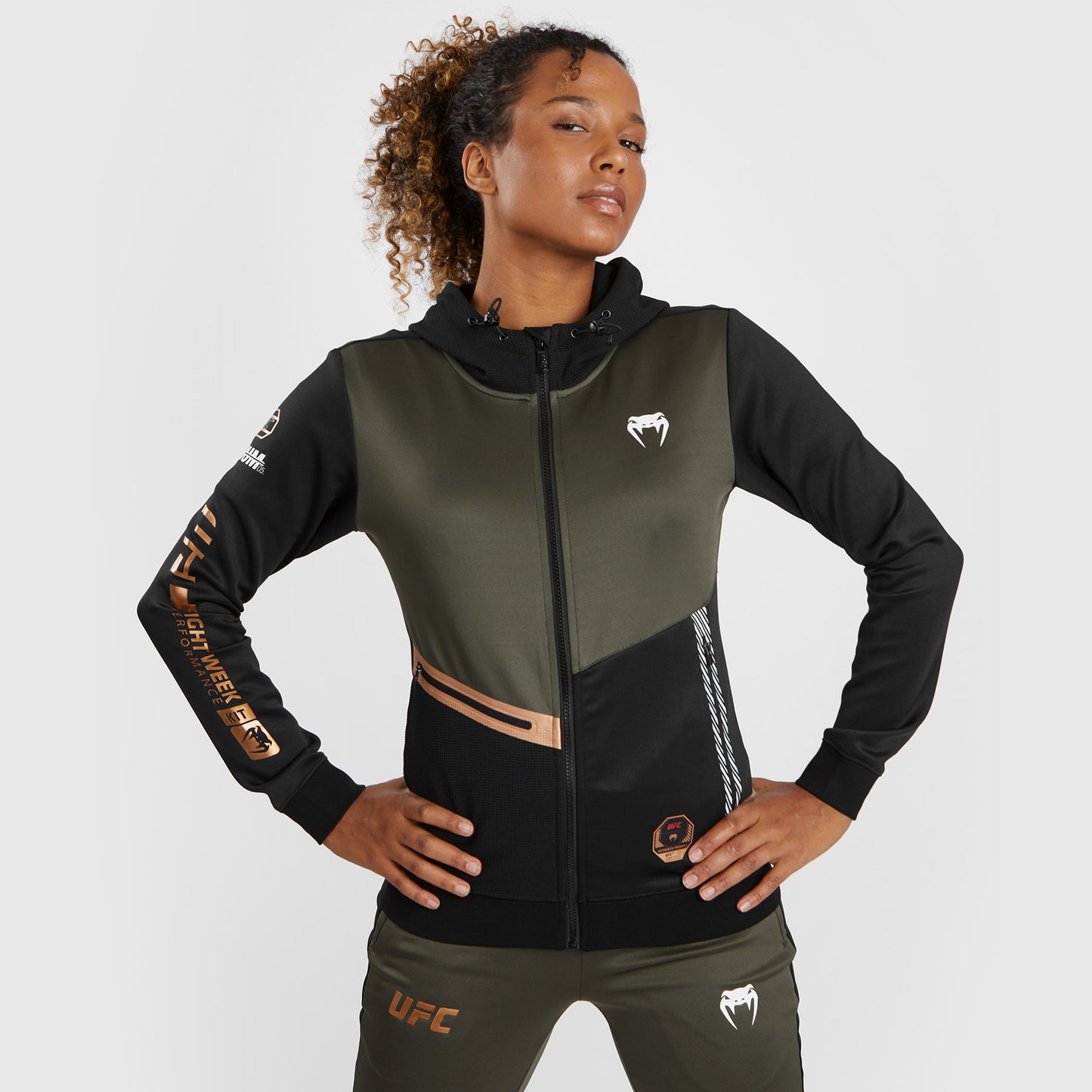 UFC Adrenaline by Venum Fight Week Sudadera con capucha y cremallera para mujer - Caqui/Bronce