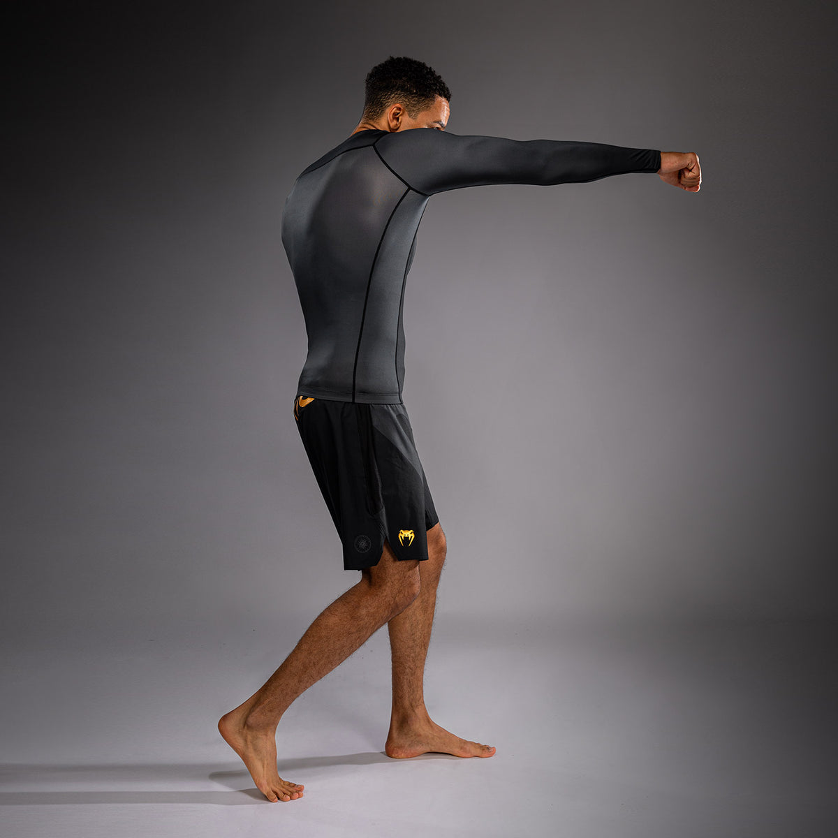 Venum Attack Rashguard de manga larga - Negro/Dorado
