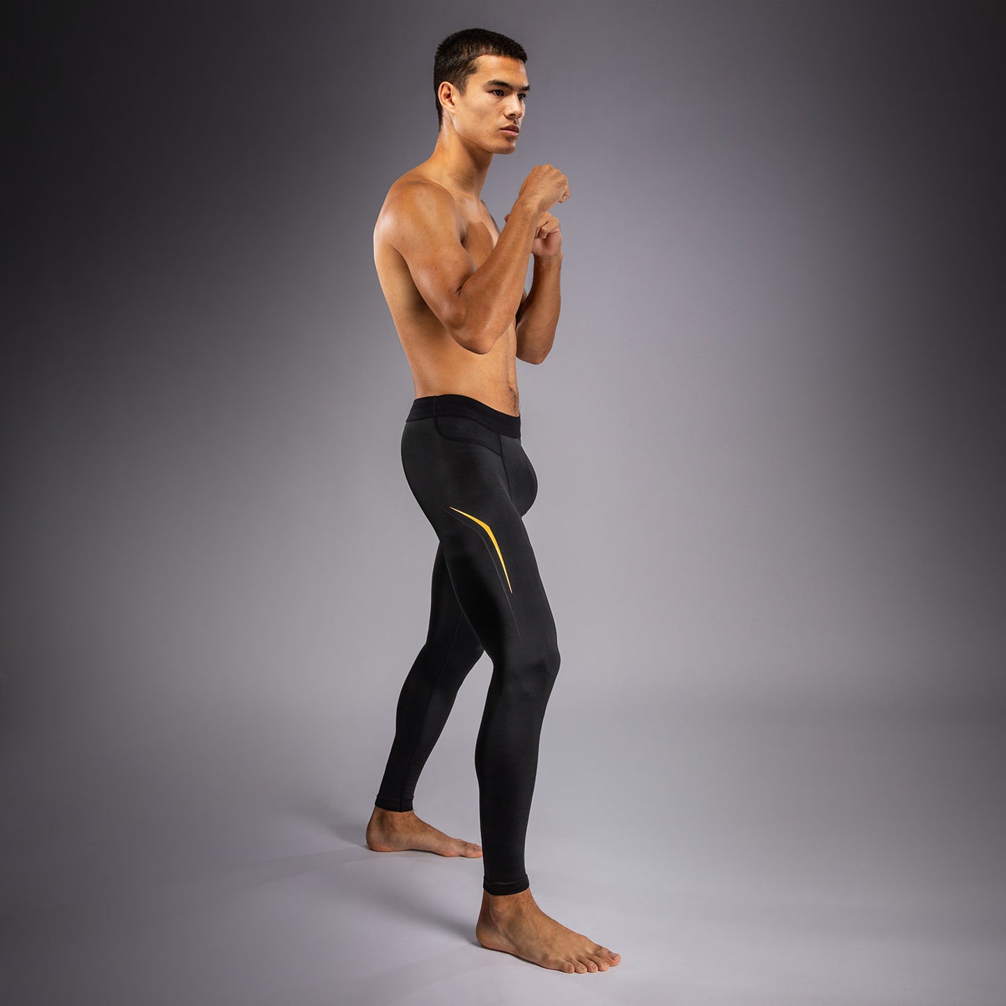 Venum G-Core Spats - Negro/Oro