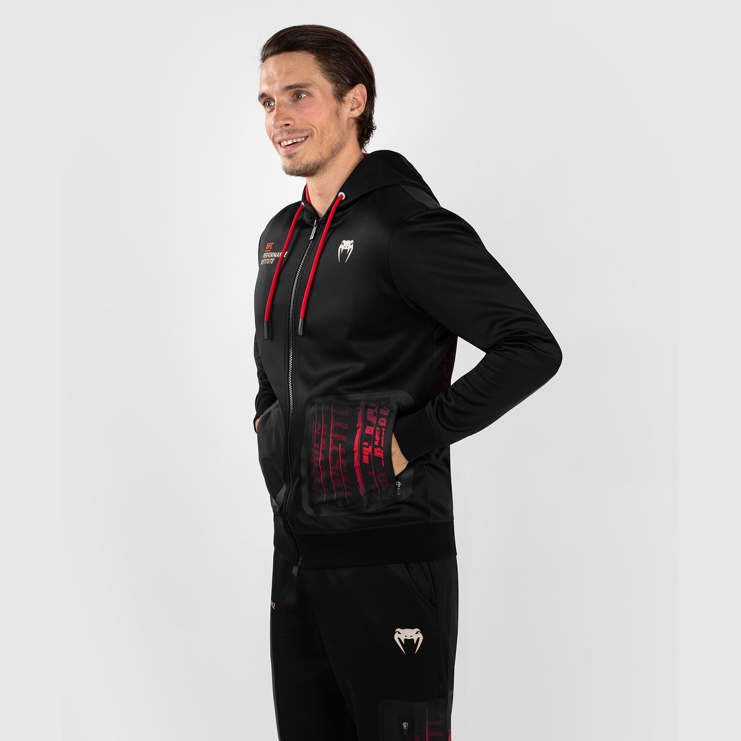 UFC Venum Performance Institute 2.0 Sudadera con cremallera para hombre - Negra/Roja
