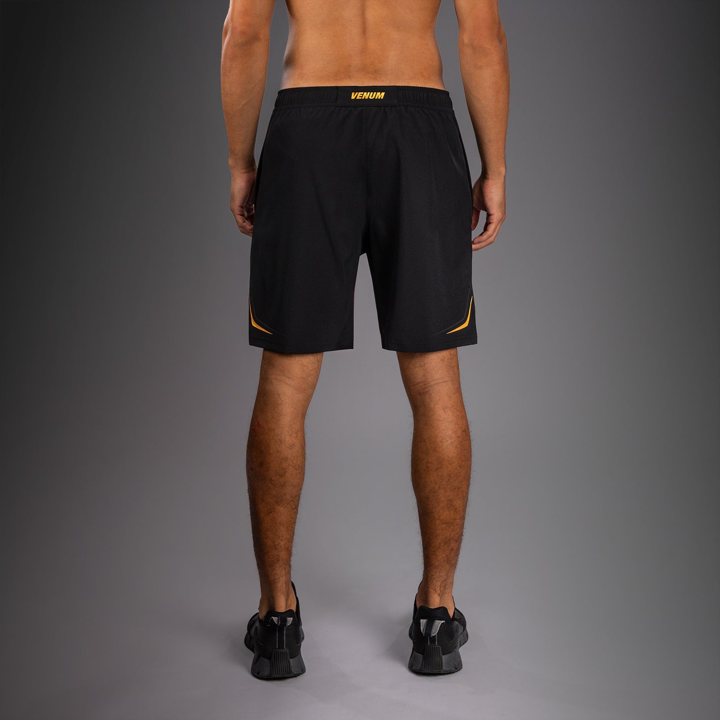 Venum G-Core Pantalón Corto de Entrenamiento - Negro/Oro