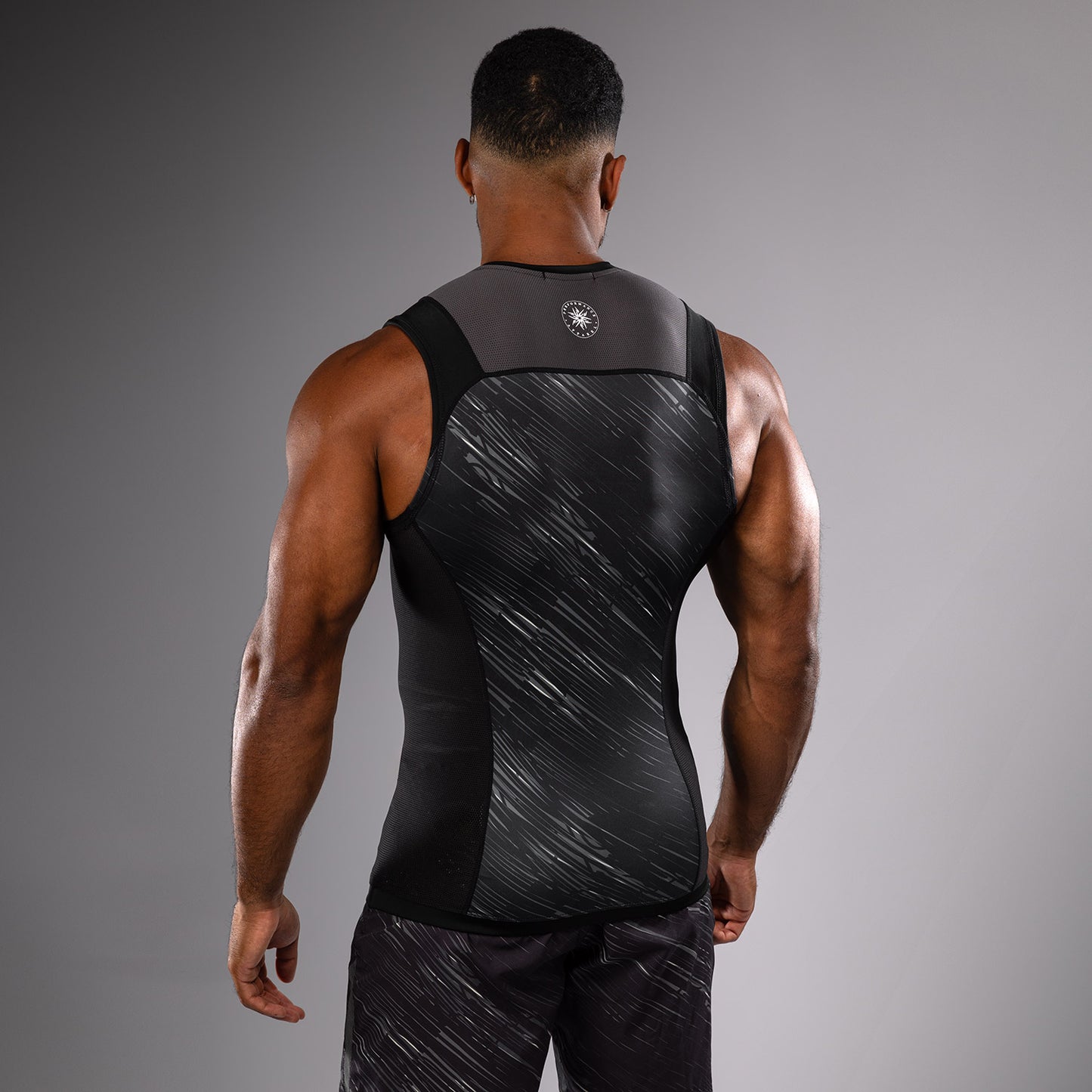 Venum Rapid Rashguard sin Manga - Negro/Gris Tormenta