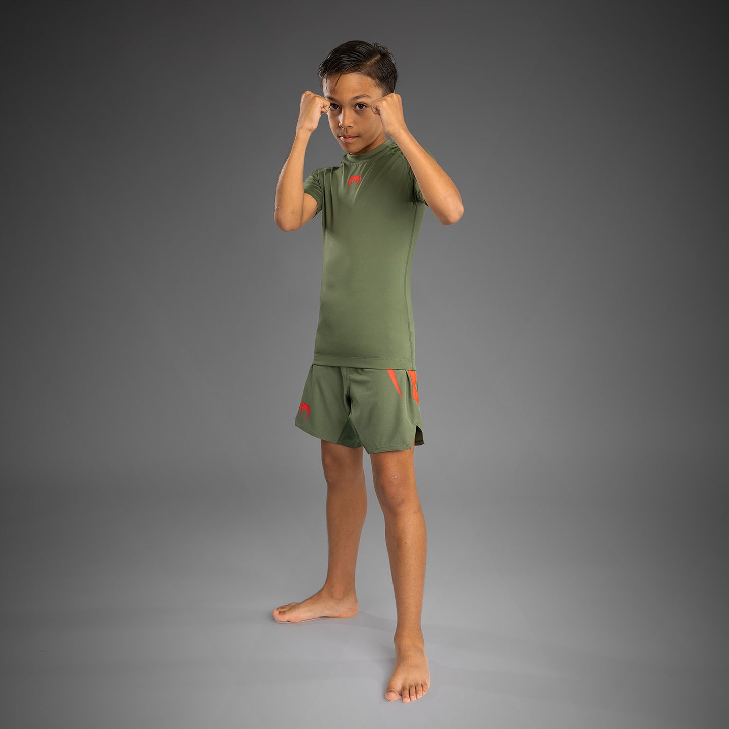 Venum Contender Rashguards Manga Corta para Niños - Verde Ejército/Naranja