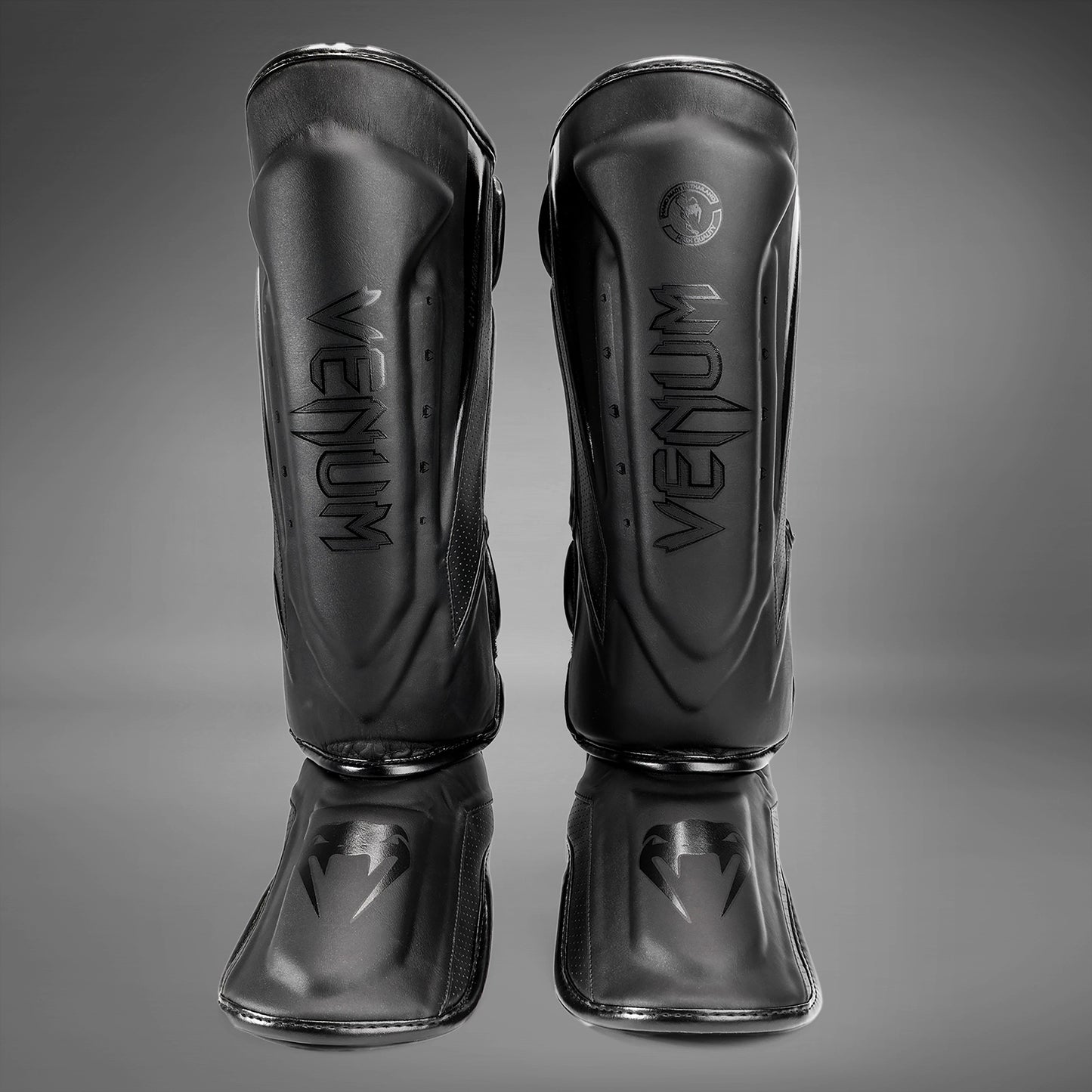 Espinilleras Venum Elite Evo - Negro/Negro