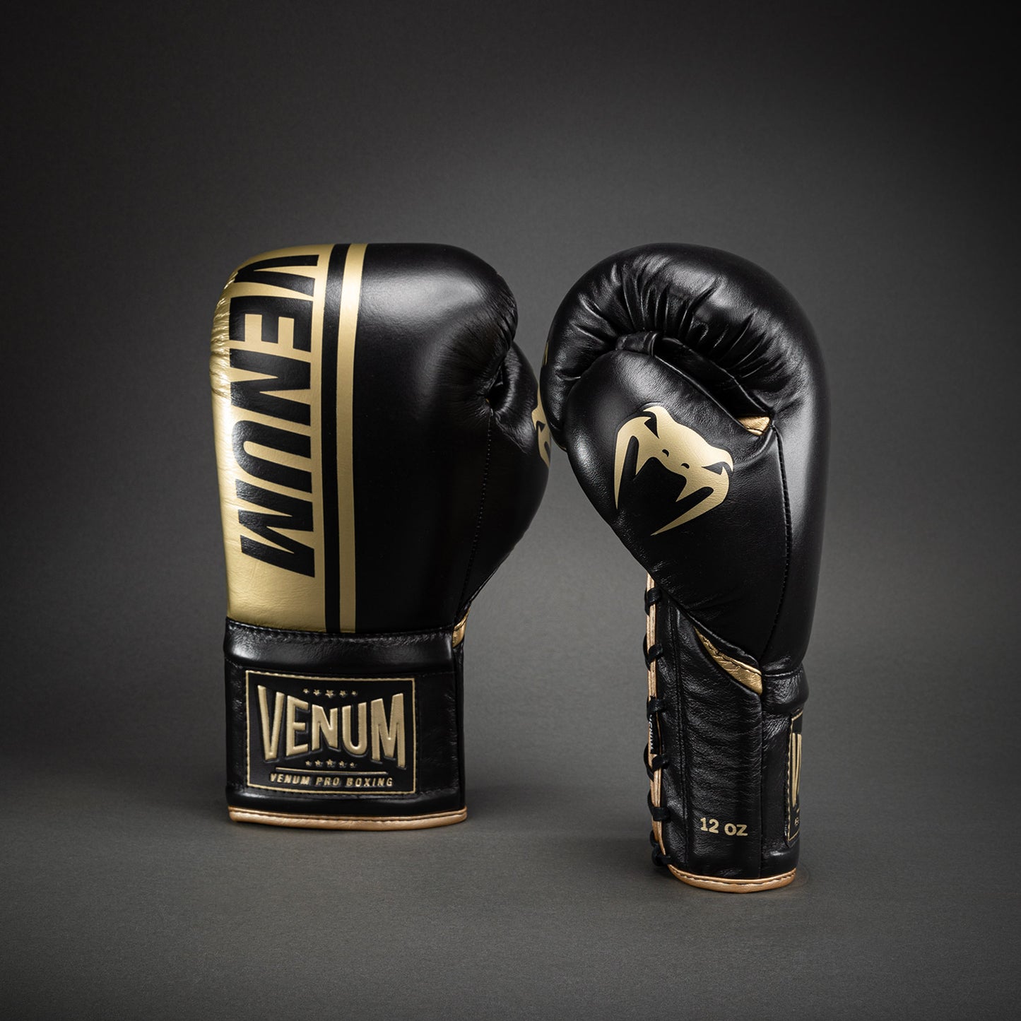 Guantes de boxeo profesionales Venum Shield con cordones - Negro/Dorado