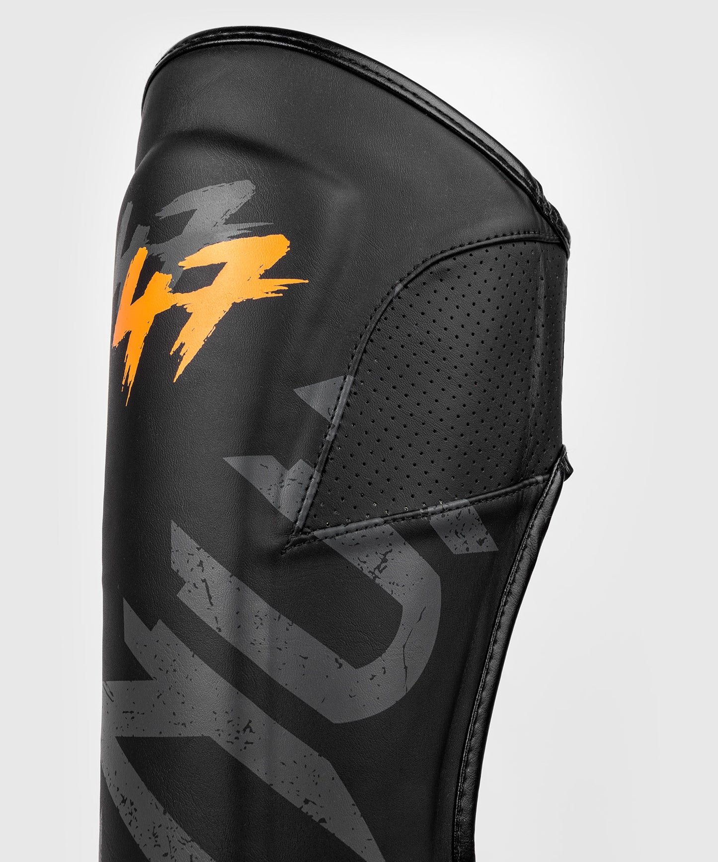 Venum S47 Espinilleras - Negro/Naranja