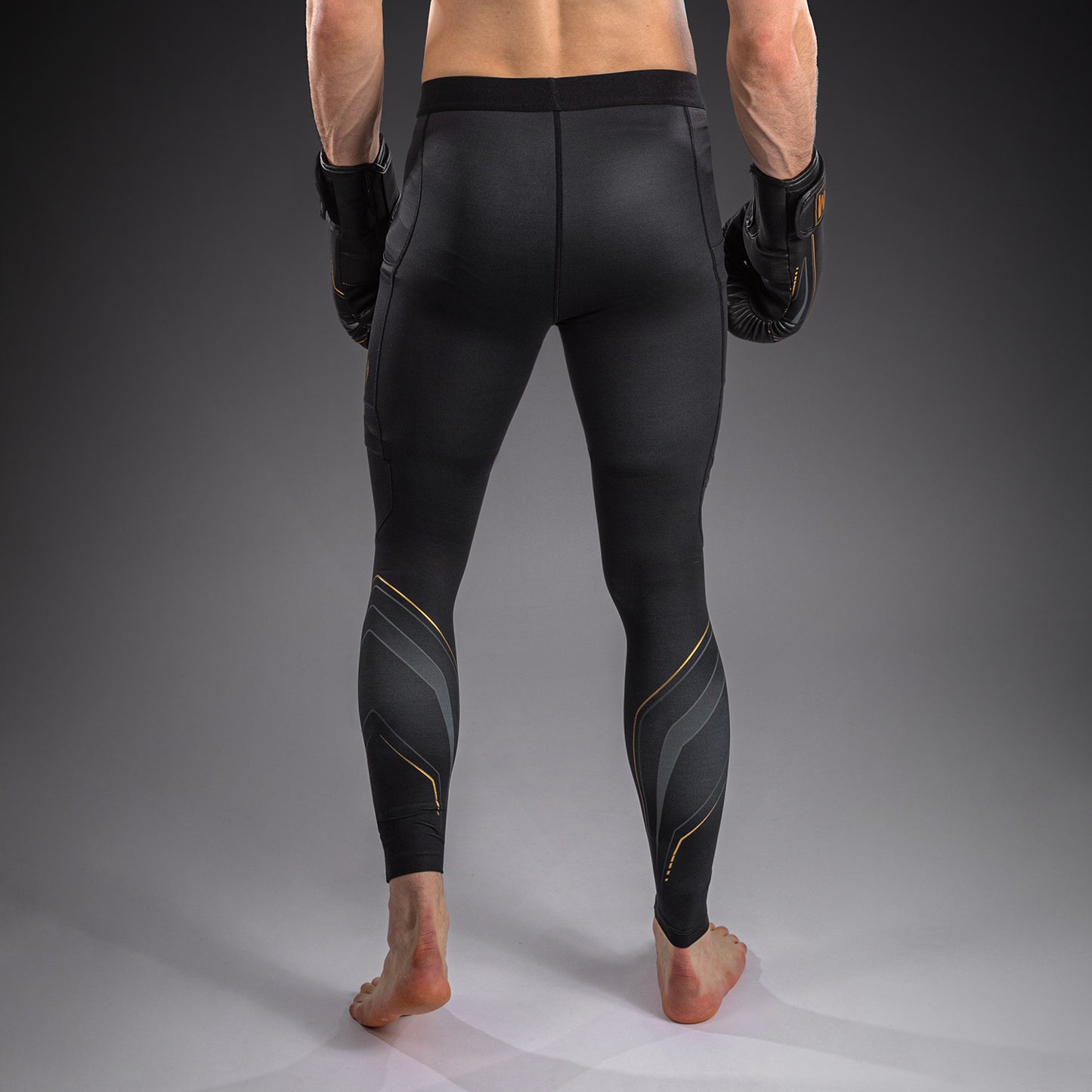 Venum Streamline Spats – Negro/Oro