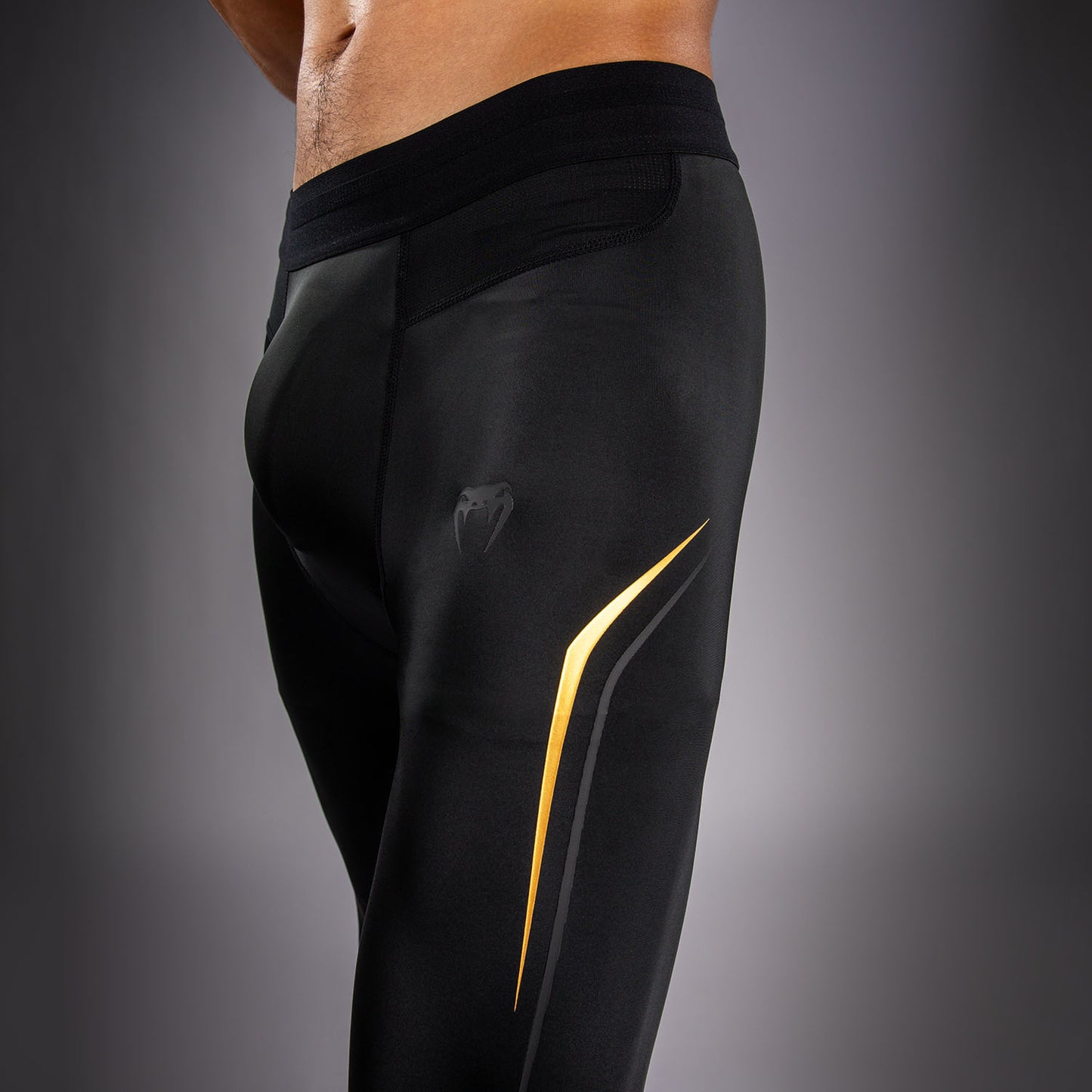 Venum G-Core Spats - Negro/Oro