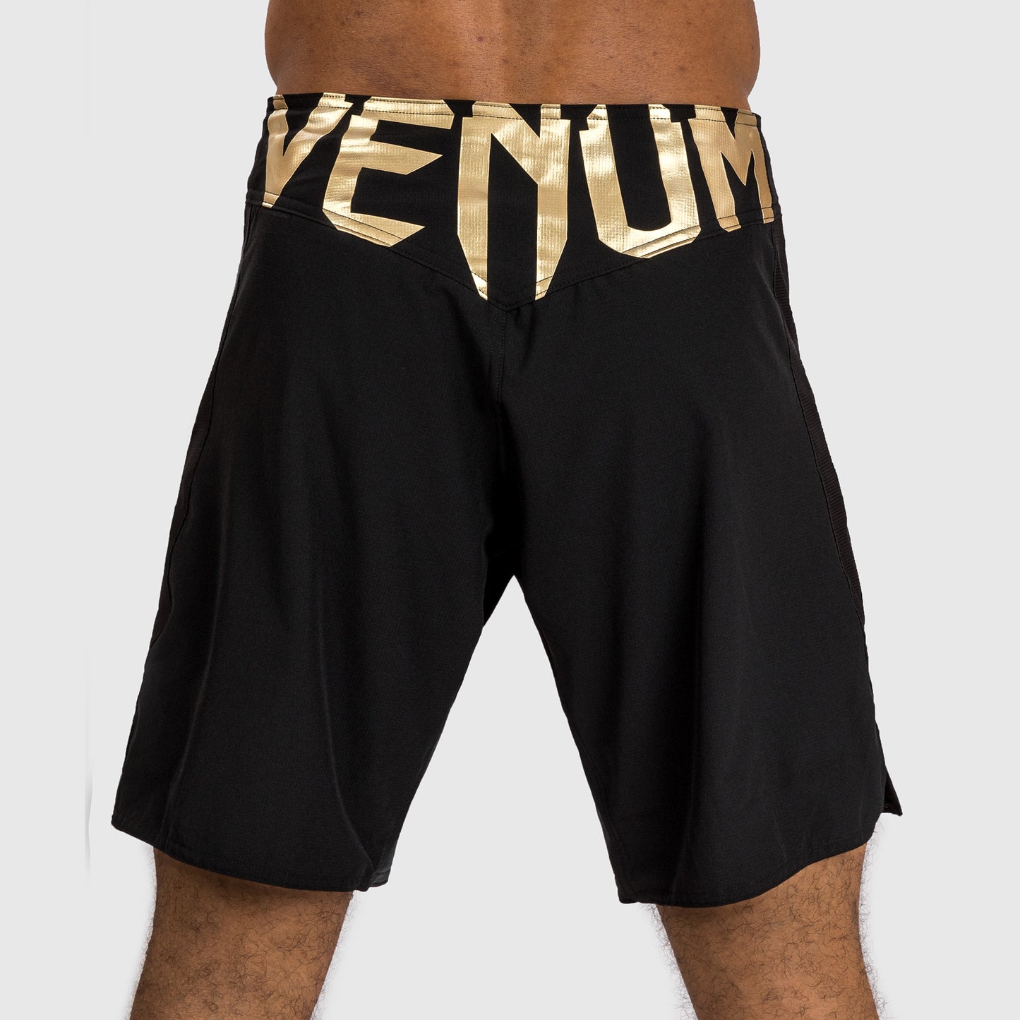 Venum Light 5.0 Fightshorts - Negro/Dorado