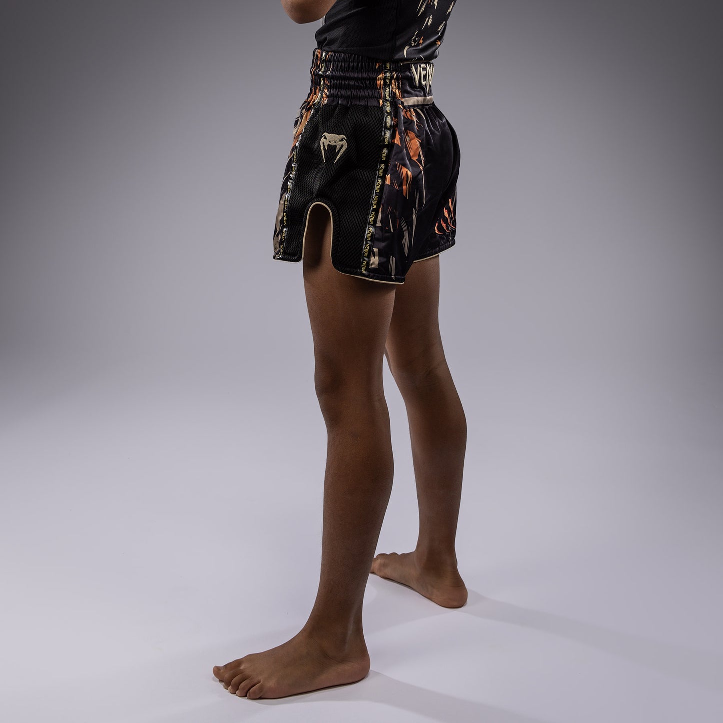 Venum Tiger Pantalones Cortos de Muay Thai para Niños - Negro/Naranja Neón