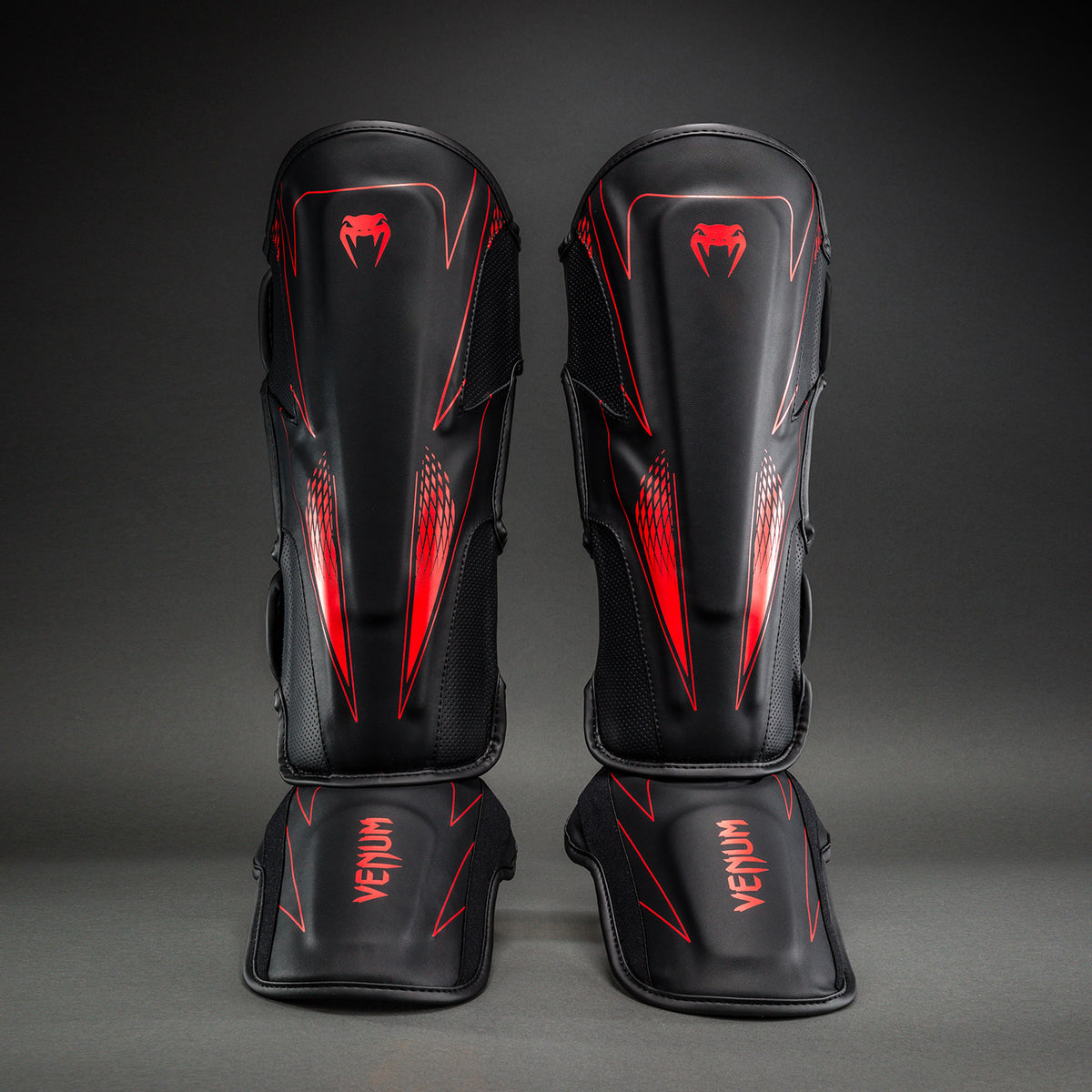 Venum Amazonia Reborn Espinilleras - Negro/Rojo