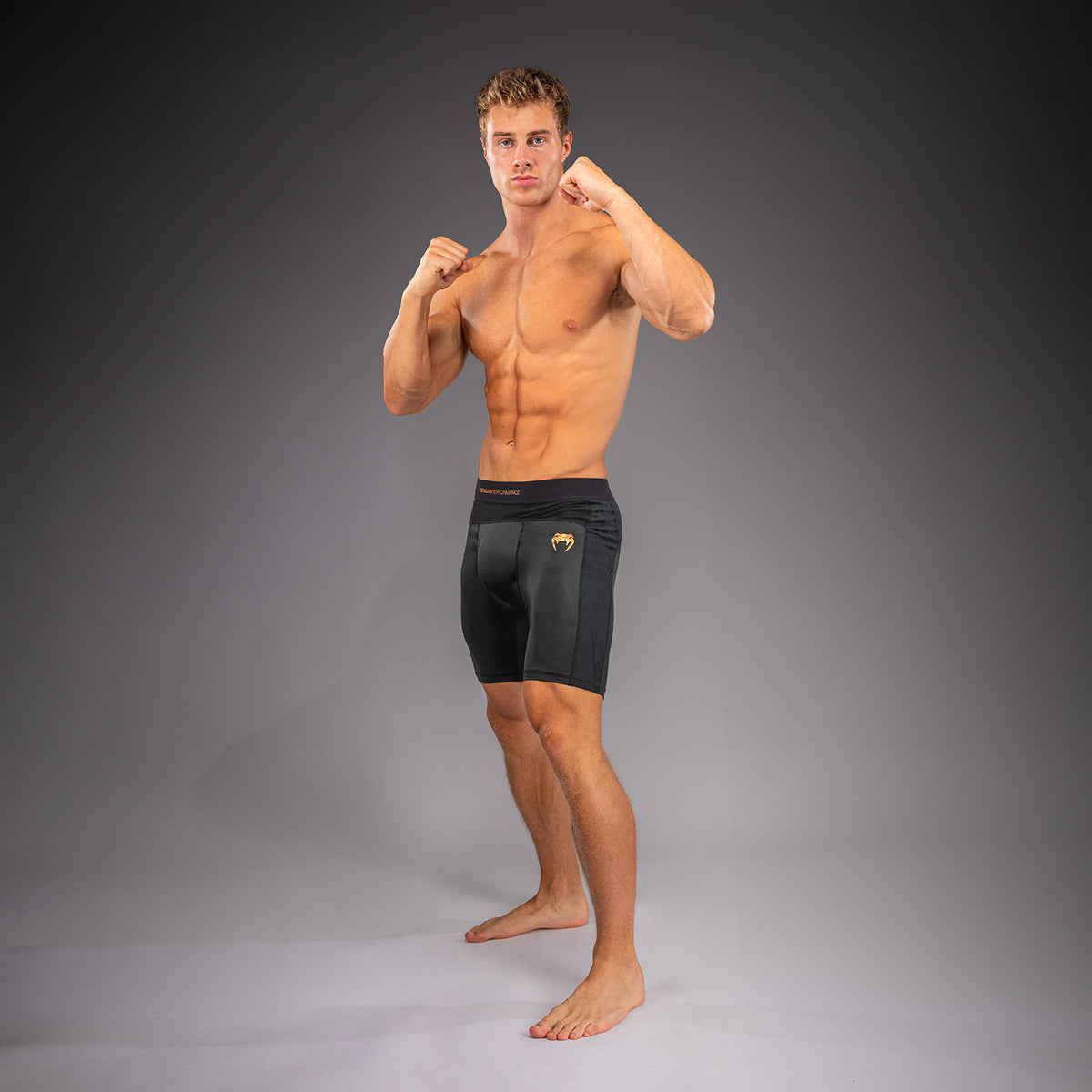 Venum G-Fit Revolution Pantalón corto de Vale Tudo - Negro/Cobre