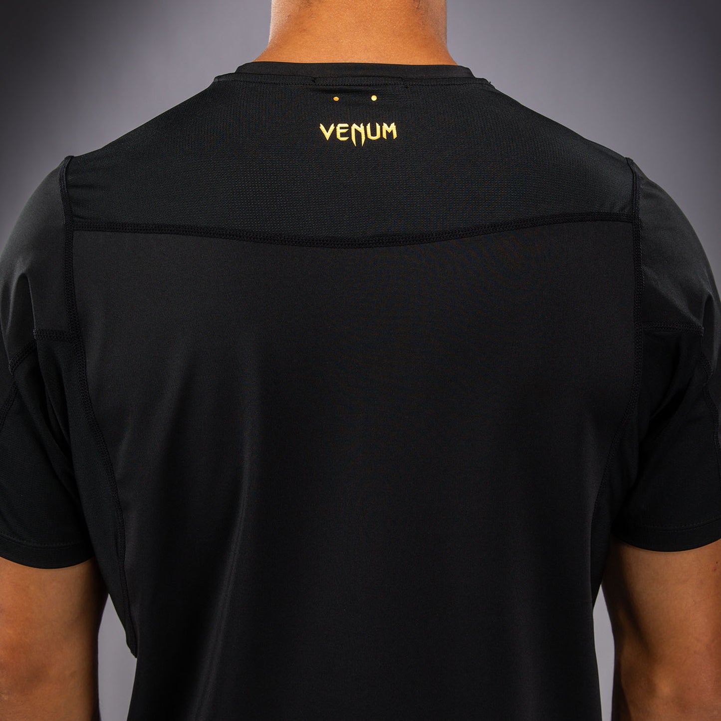 Venum G-Core Camiseta Dry Tech - Negro/Oro