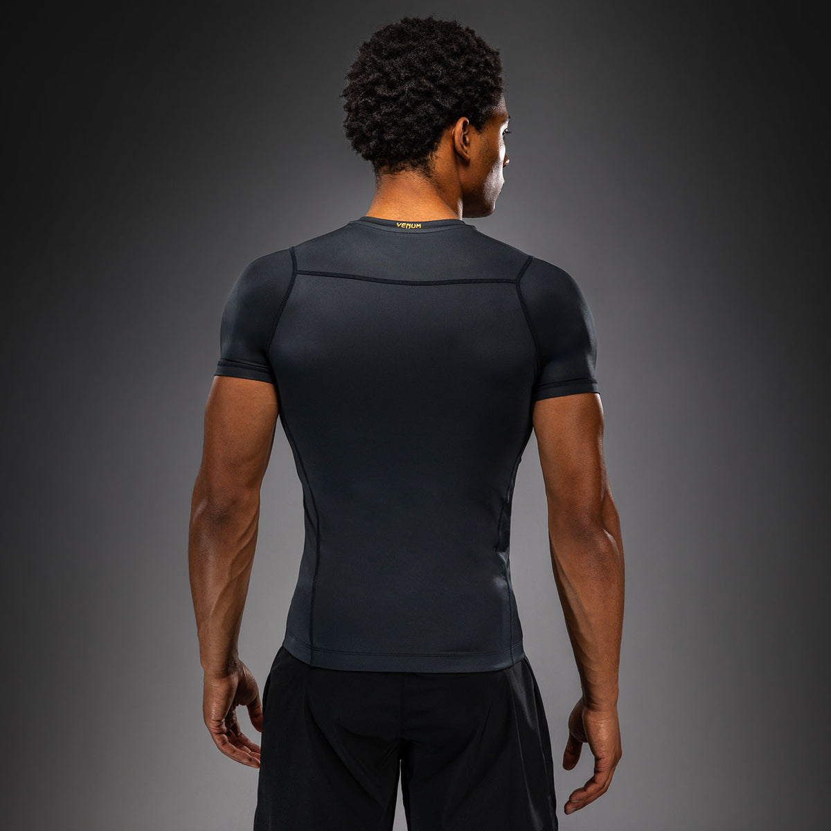 Venum Attack Rashguard de manga corta - Negro/Dorado