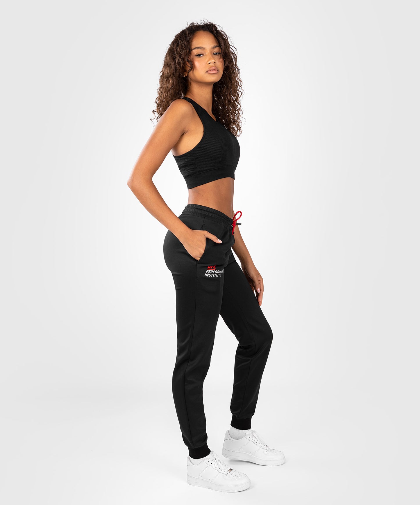 UFC Venum Performance Institute 2.0 Pantalón de Chándal para Mujer - Negro/Rojo