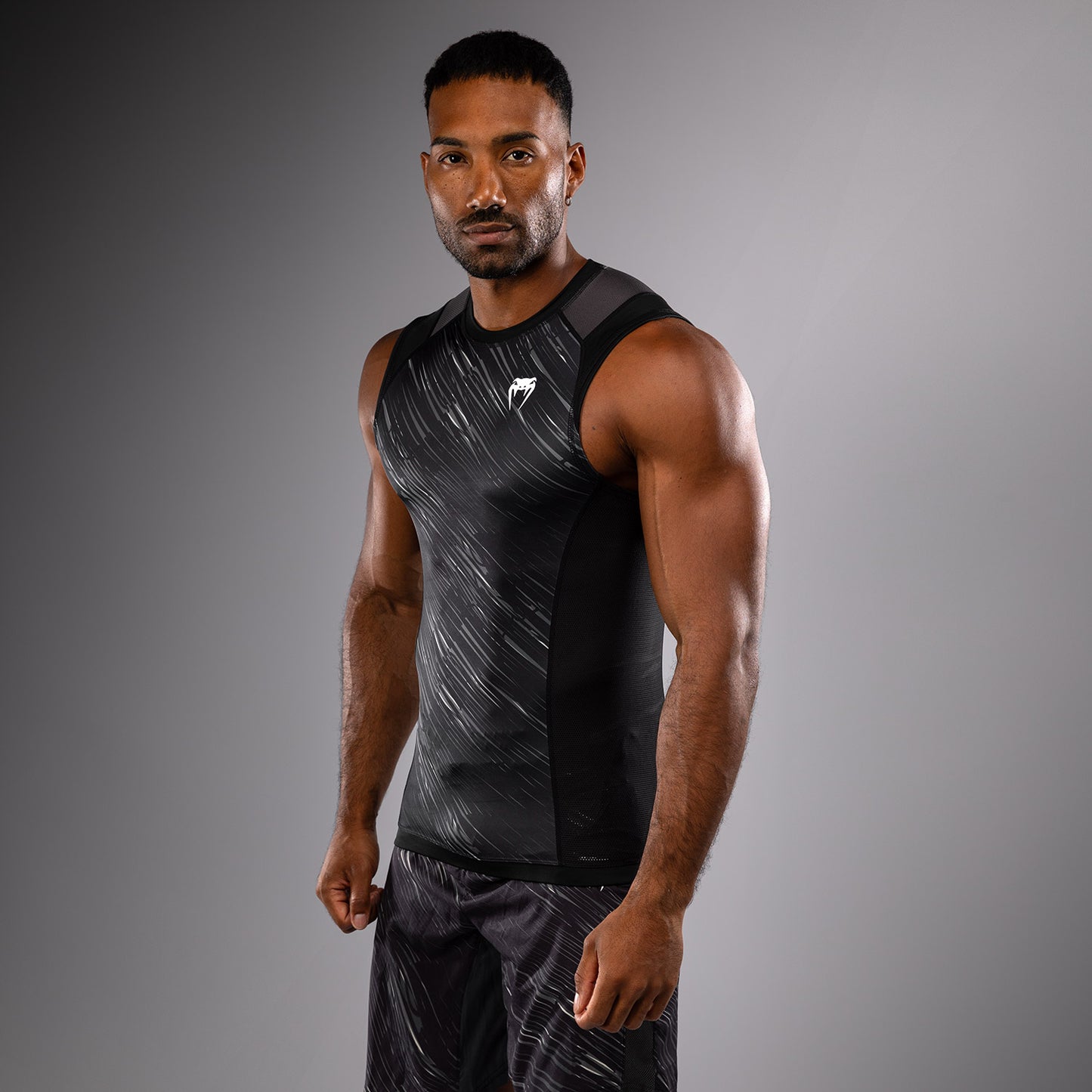 Venum Rapid Rashguard sin Manga - Negro/Gris Tormenta