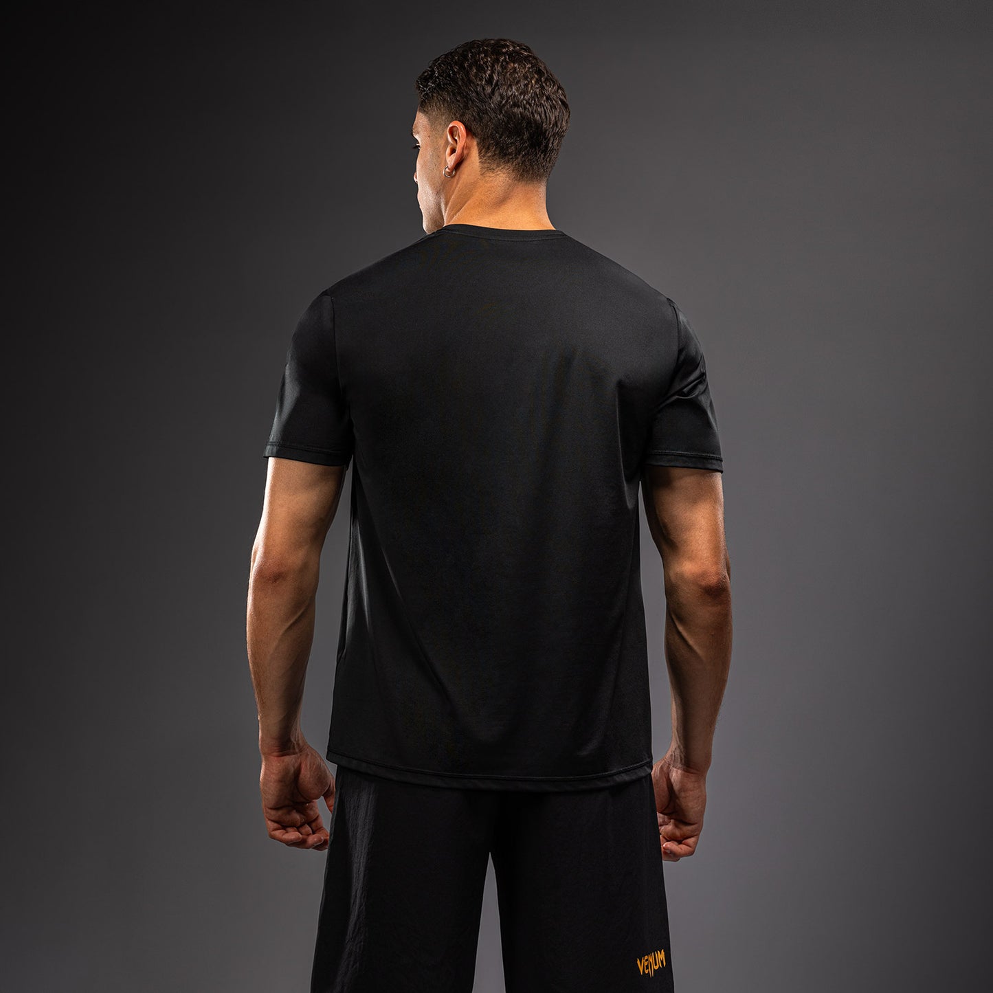 Venum Classic Camiseta Dry Tech - Negro/Dorado