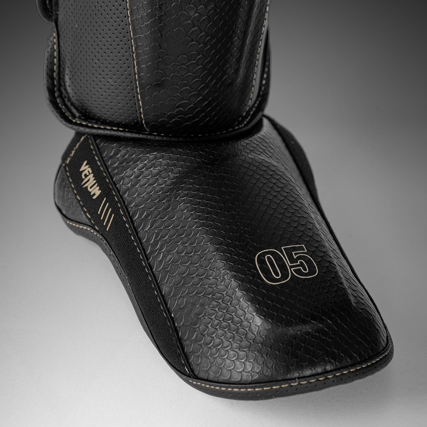 Venum Impact Evo Scales Espinilleras – Negro