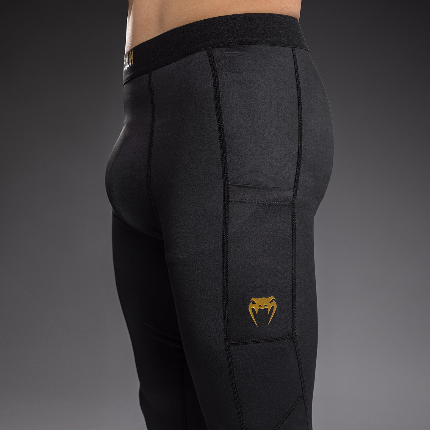 Venum Streamline Spats – Negro/Oro