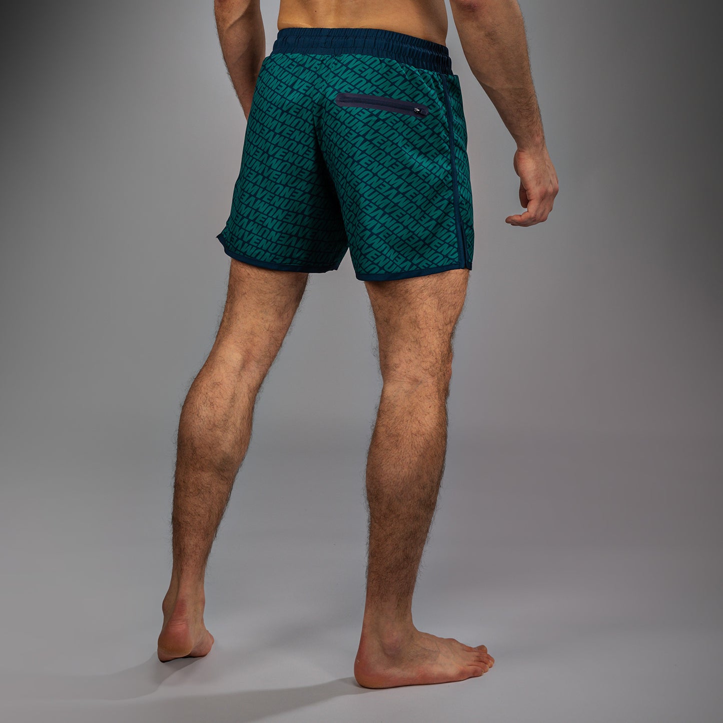 Venum Echo Board Shorts - Azul Profundo/Verde Esmeralda